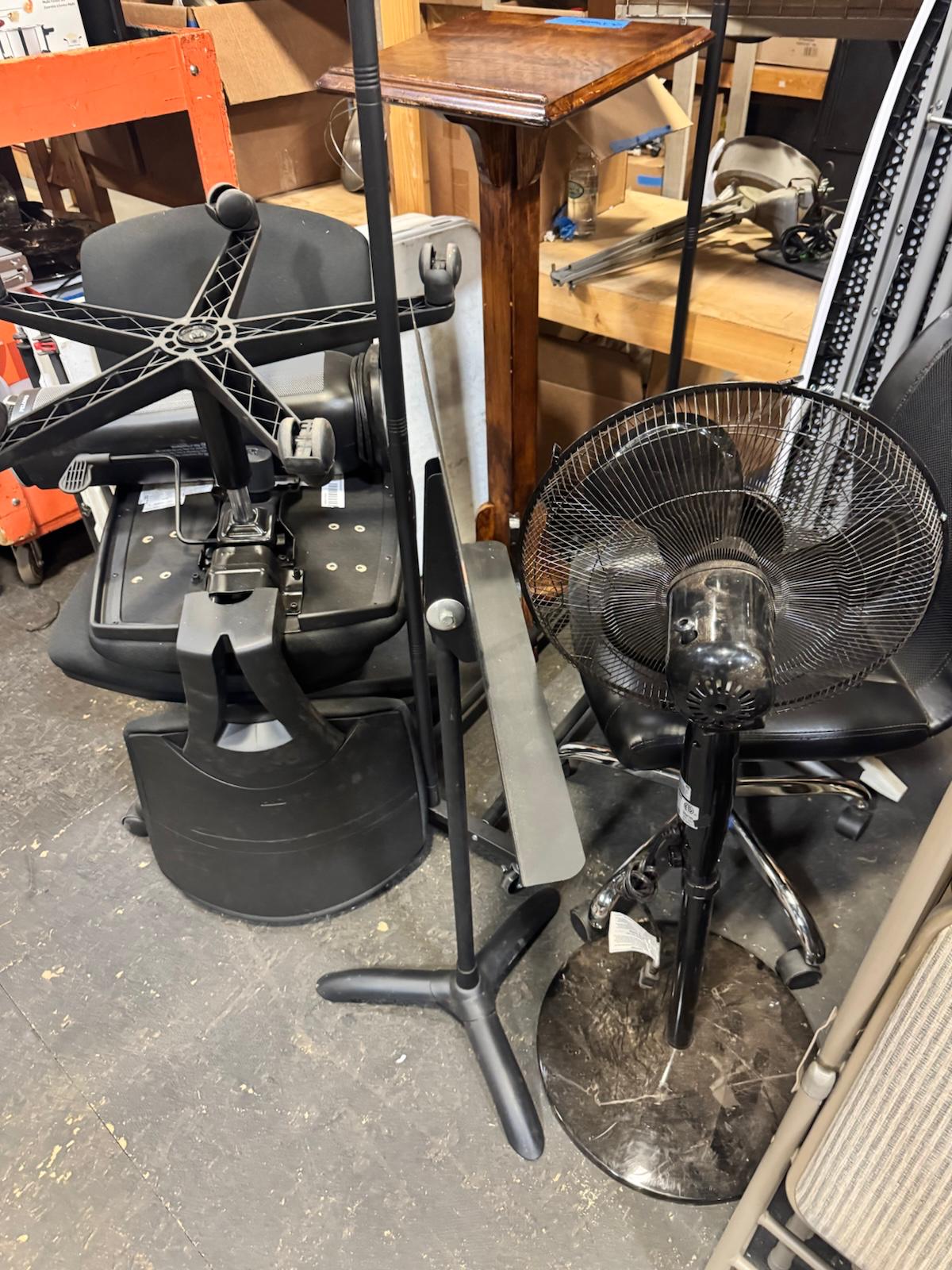 Office chairs, standing fan and lamp donated by Netflix Set Deck Department