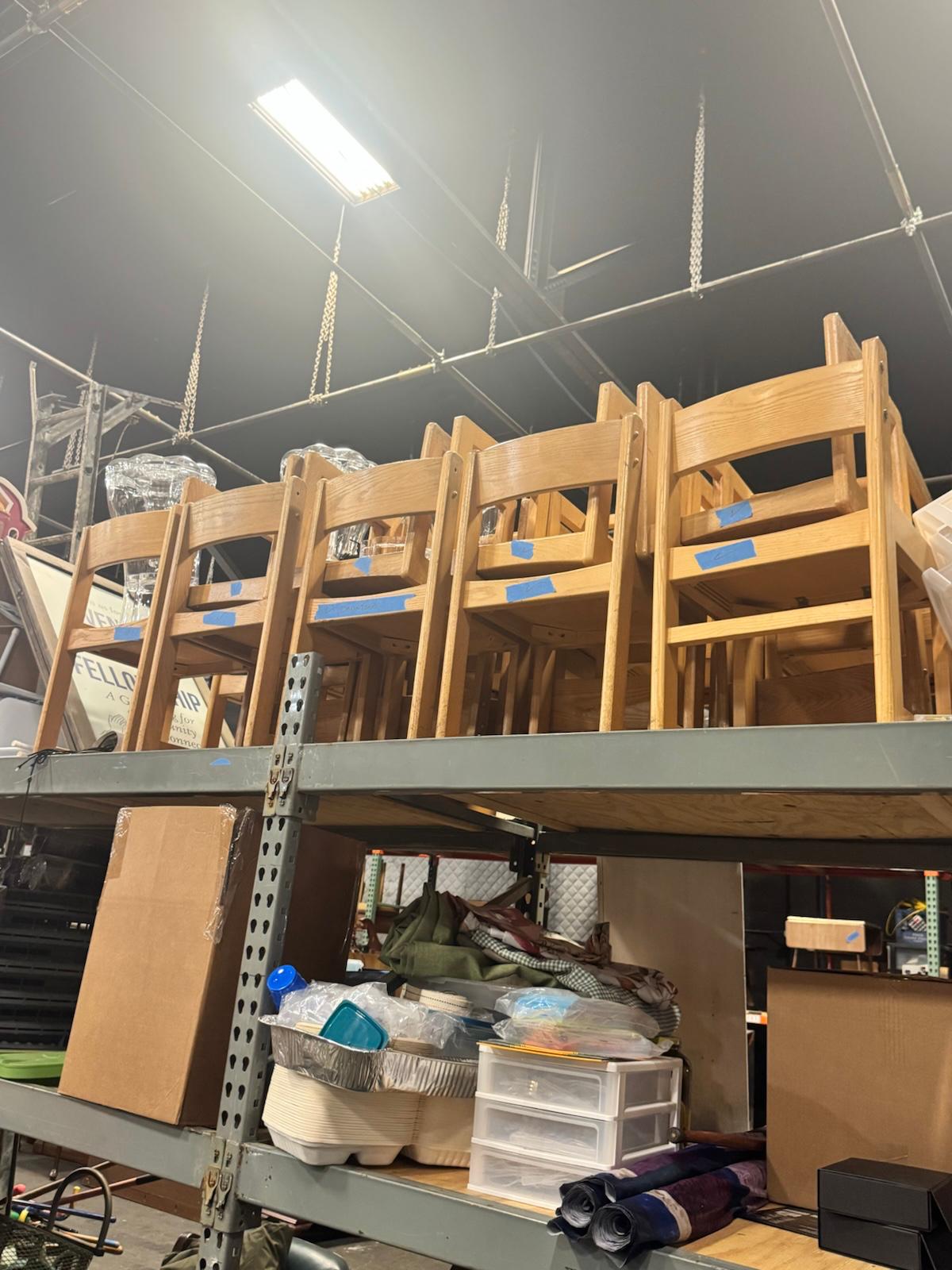 Wooden chairs donated by Netflix Set Deck Department