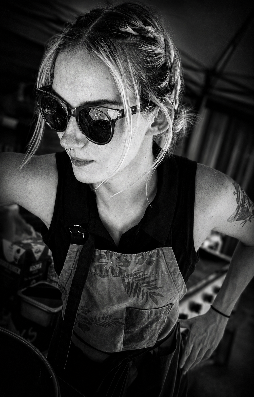 Woman in apron — B&W field portrait by Sidewalk Stories Photography, Flint Car Show