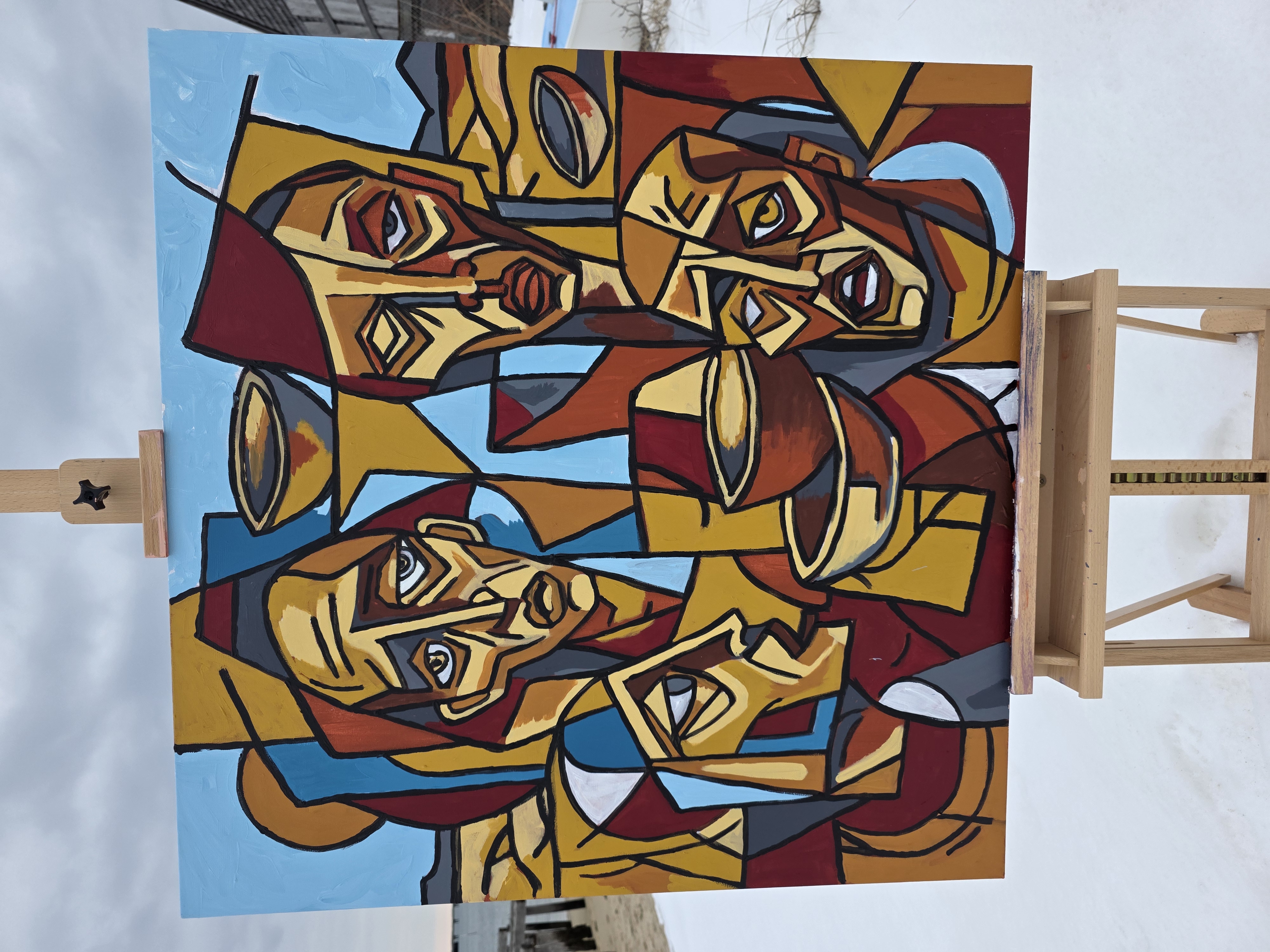 Tadhg Slater painting outdoors on snow-covered beach in Provincetown