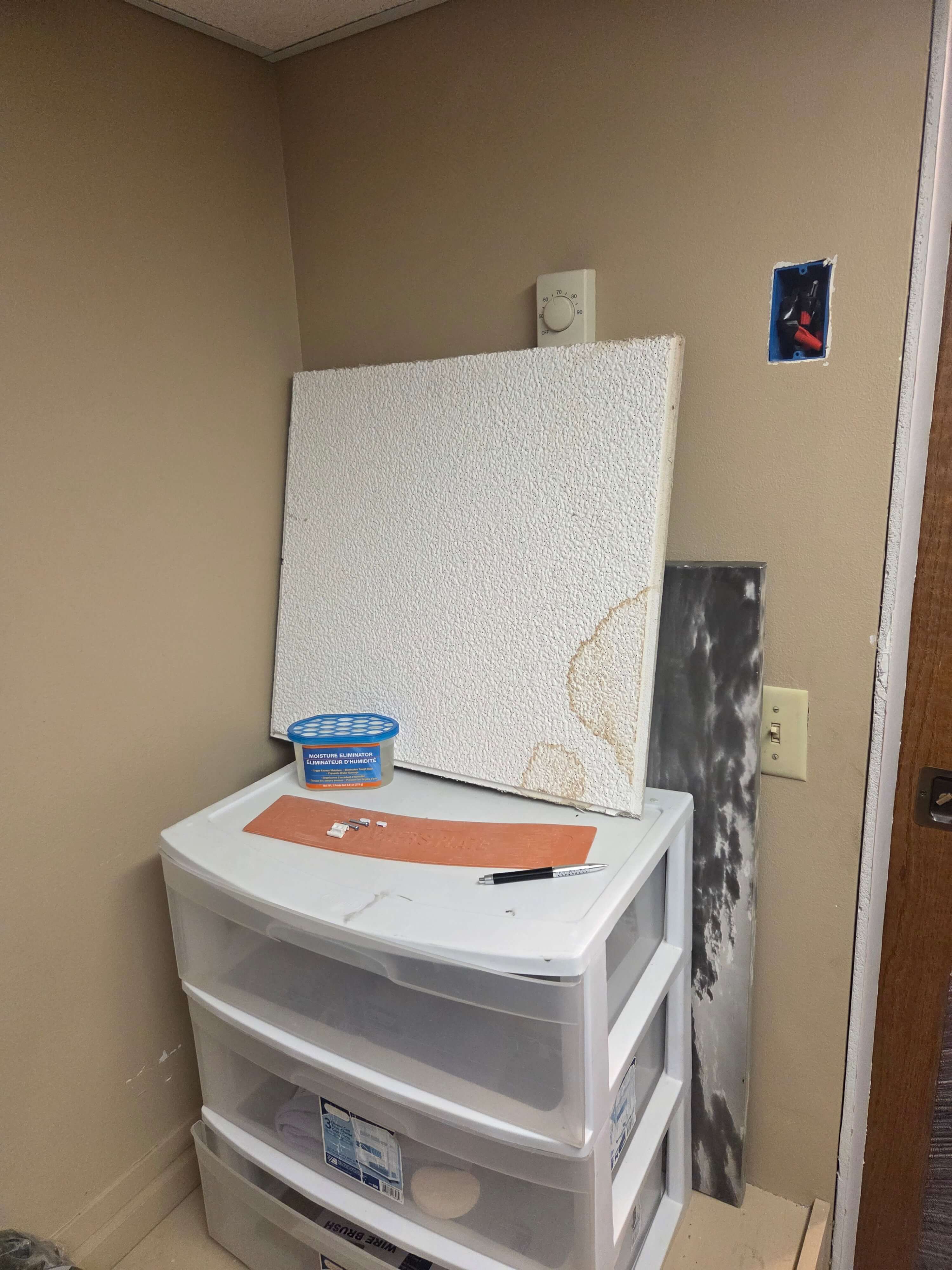 Before - water-damaged ceiling tile