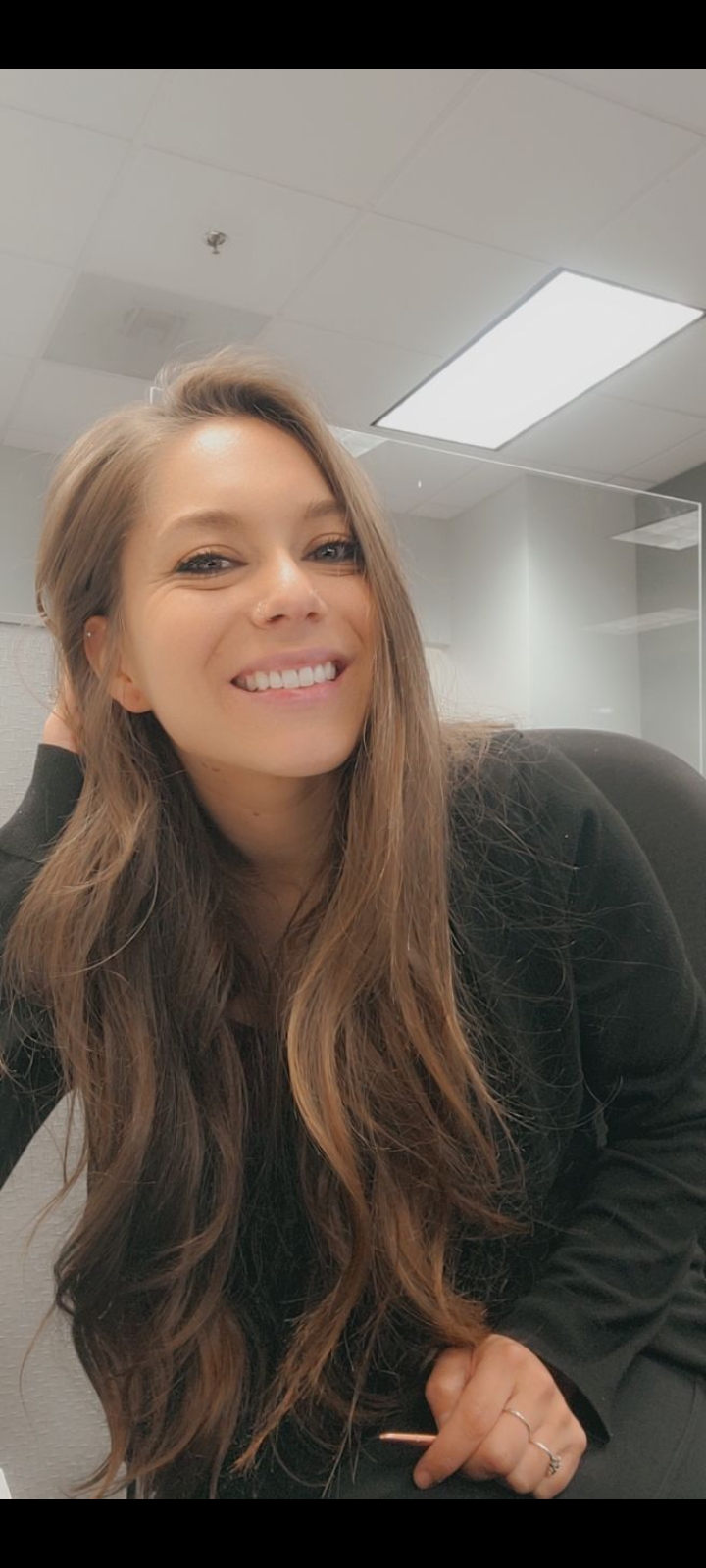 Trish at her desk as an Insurance Administrative Assistant
