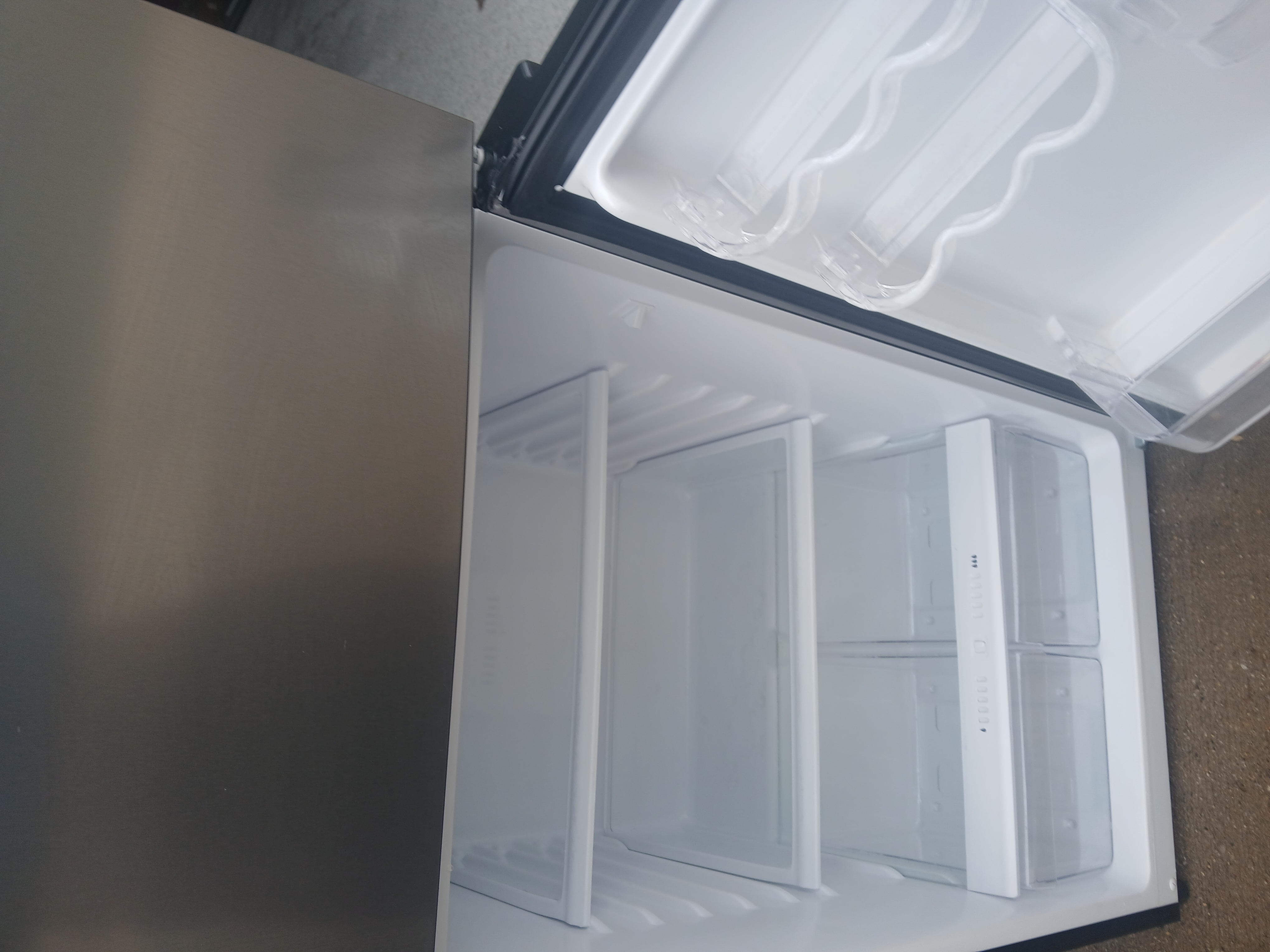 Refrigerator after — spotless shelves, crystal clear