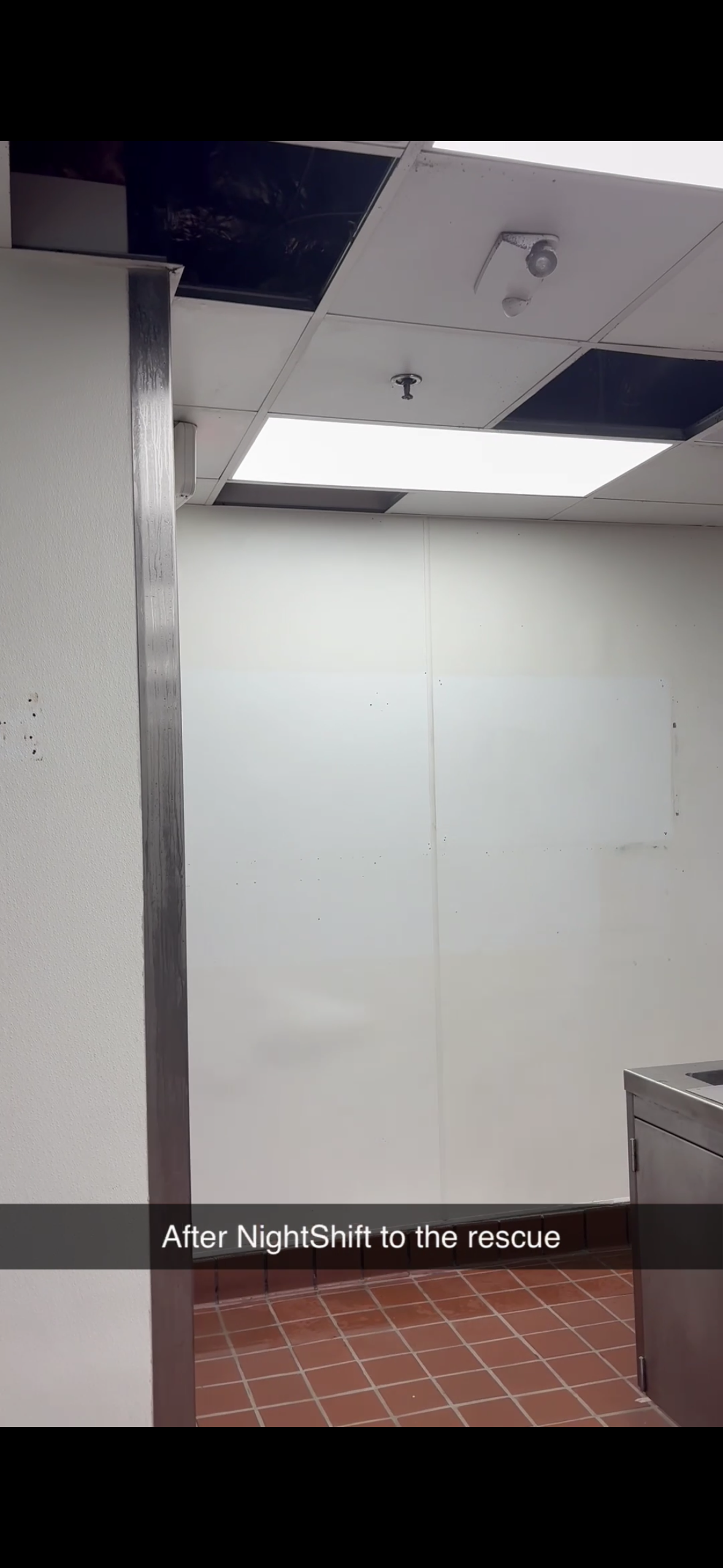 Kitchen after — restored stainless steel