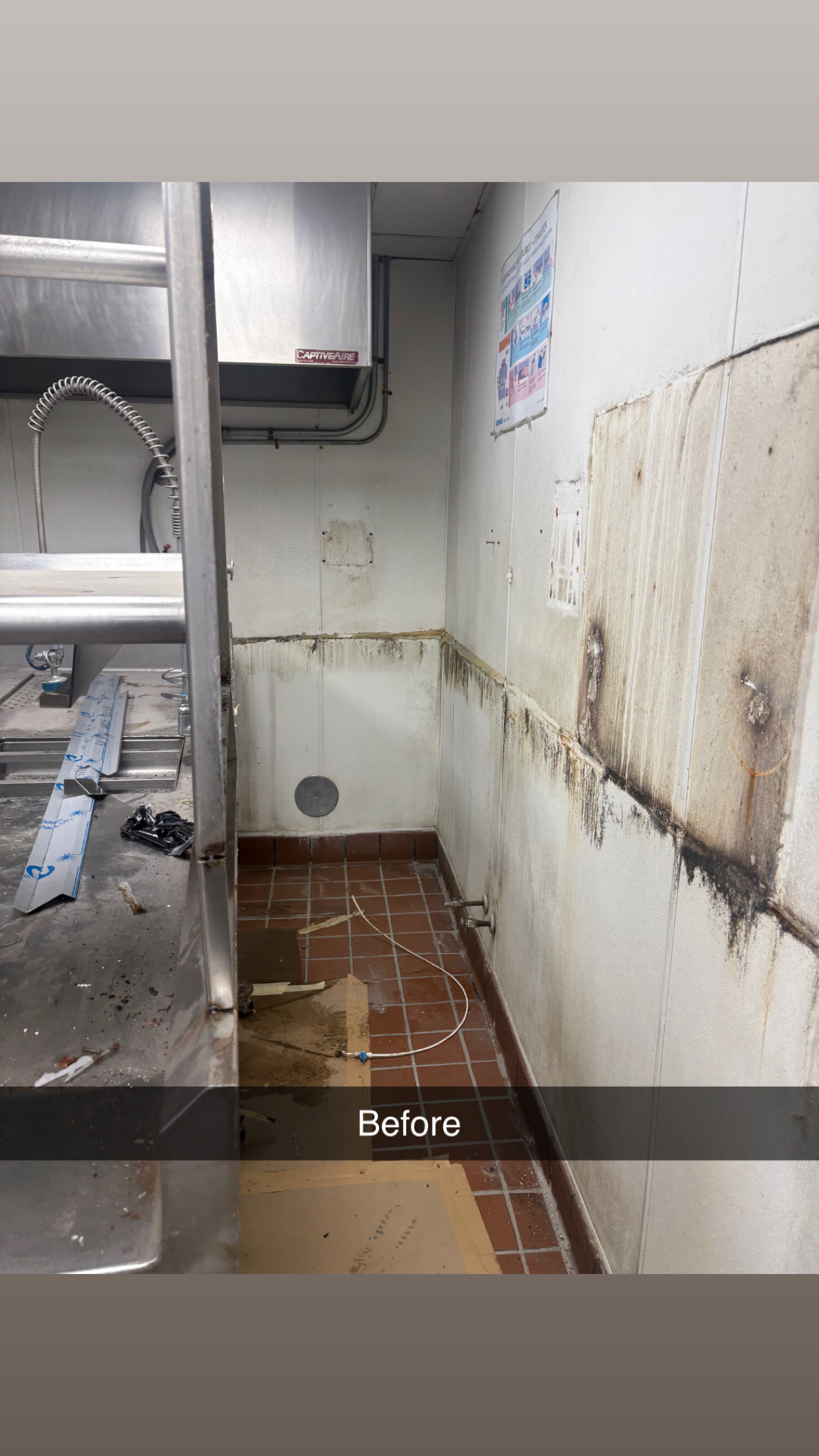 Kitchen before — grease buildup on tile floor