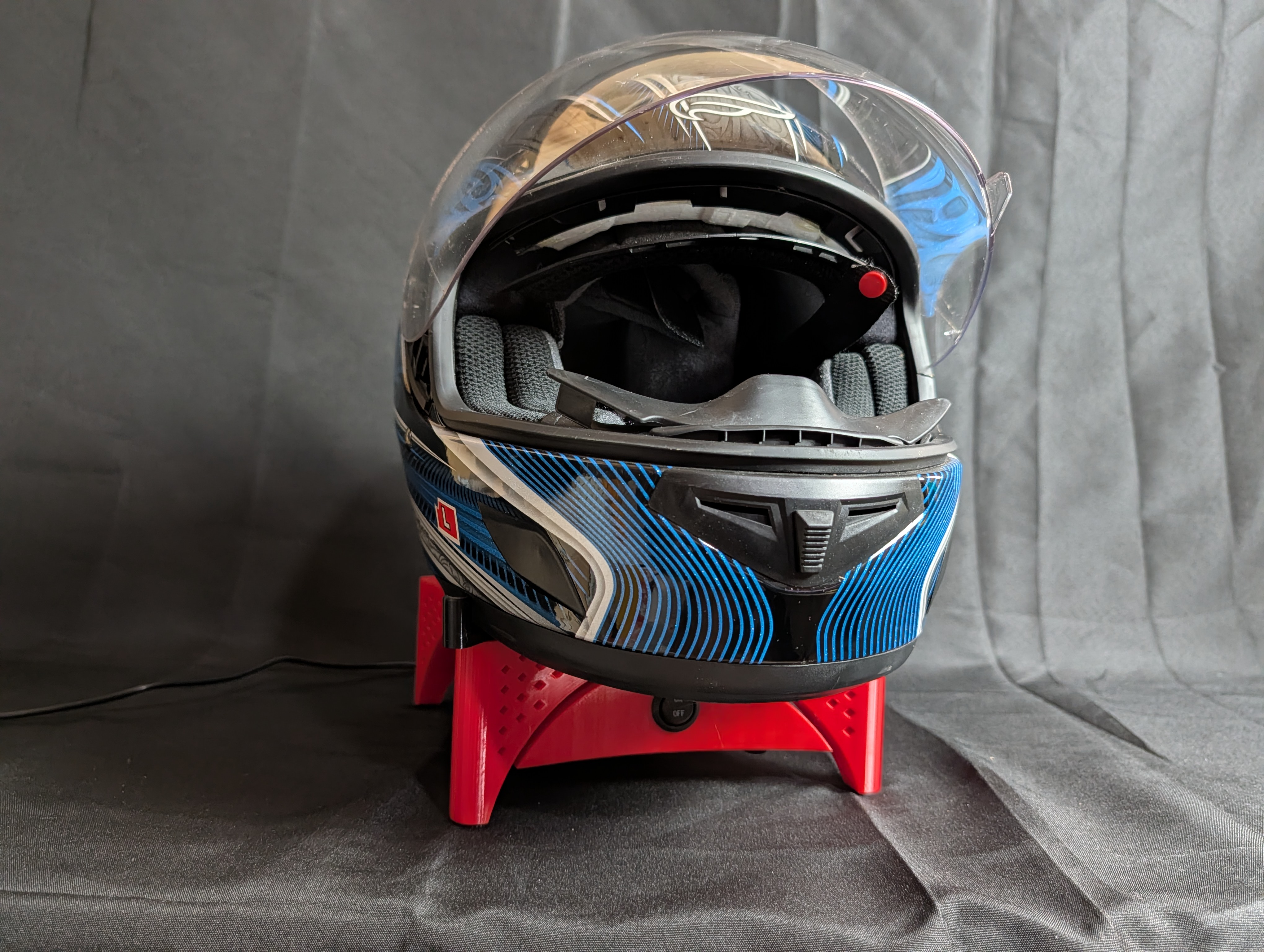 Red helmet dryer