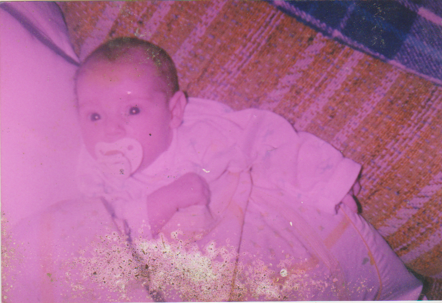 Before restoration — Color correction to 1970's baby picture to restore natural photograph tones