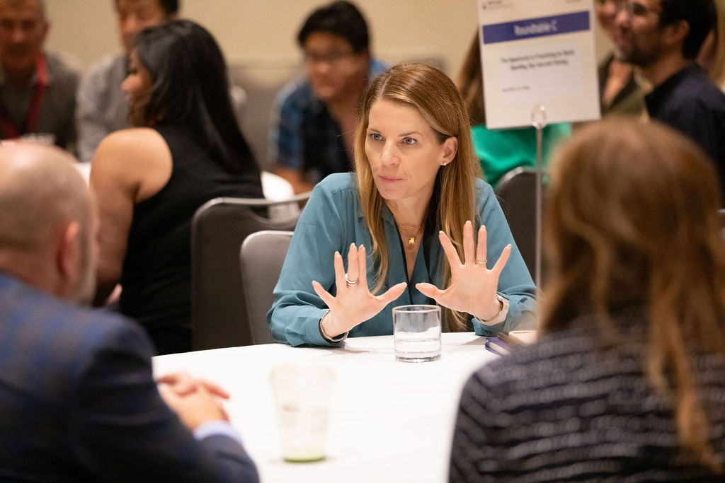 Amy Nichols leading a roundtable discussion