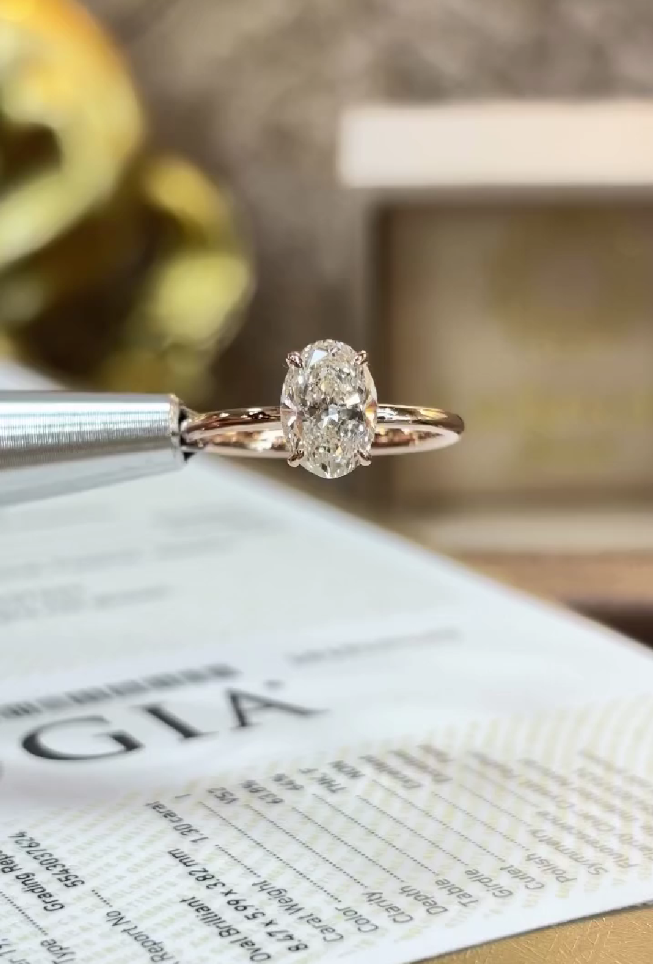 GIA certified diamond under loupe showing grading