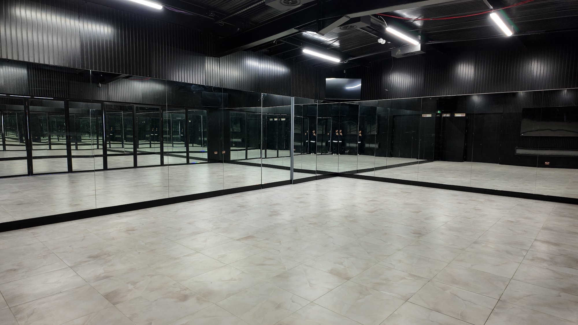 PYAANO Studio — mirrored walls and open floor