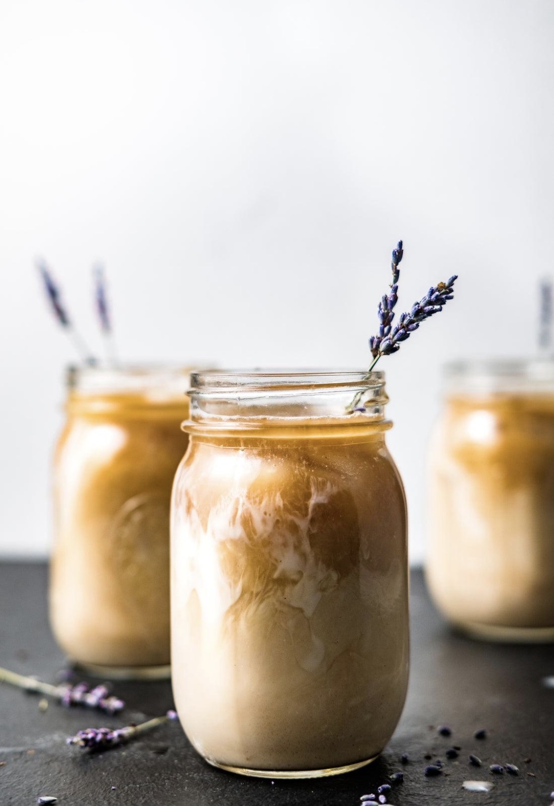 Lavender latte in a cup with purple hue