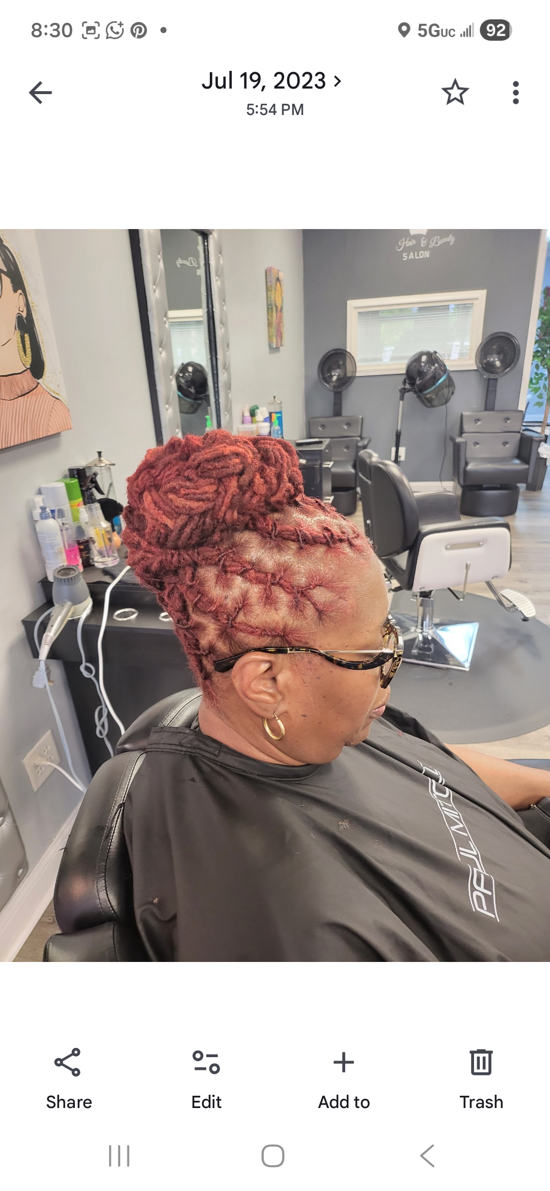 Red burgundy colored loc updo — loc color and styling Sinkor Beauty Salon