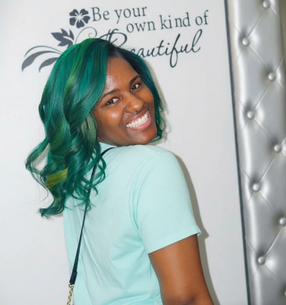 Vibrant green hair color transformation at Sinkor Beauty