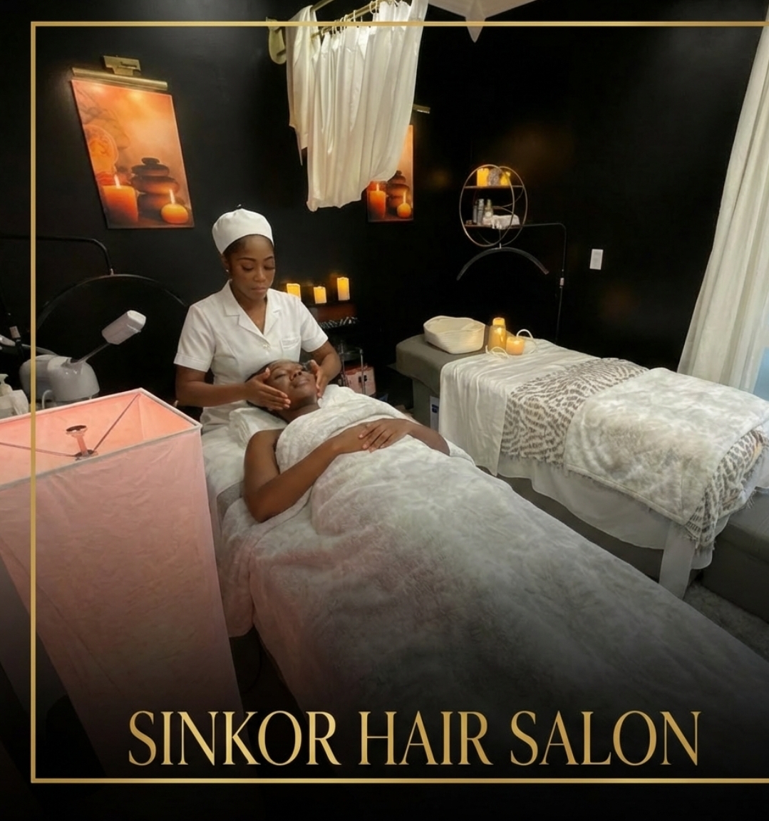 Facial treatment in spa room at Sinkor Beauty Salon — candles and full ambiance