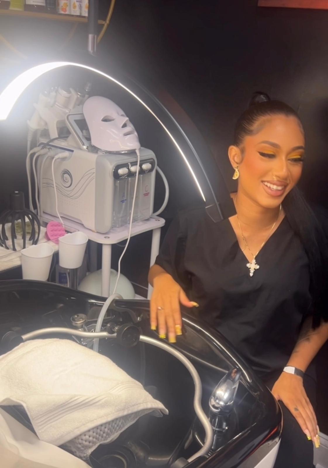 Head Spa — Stylist with hydrafacial and LED mask equipment