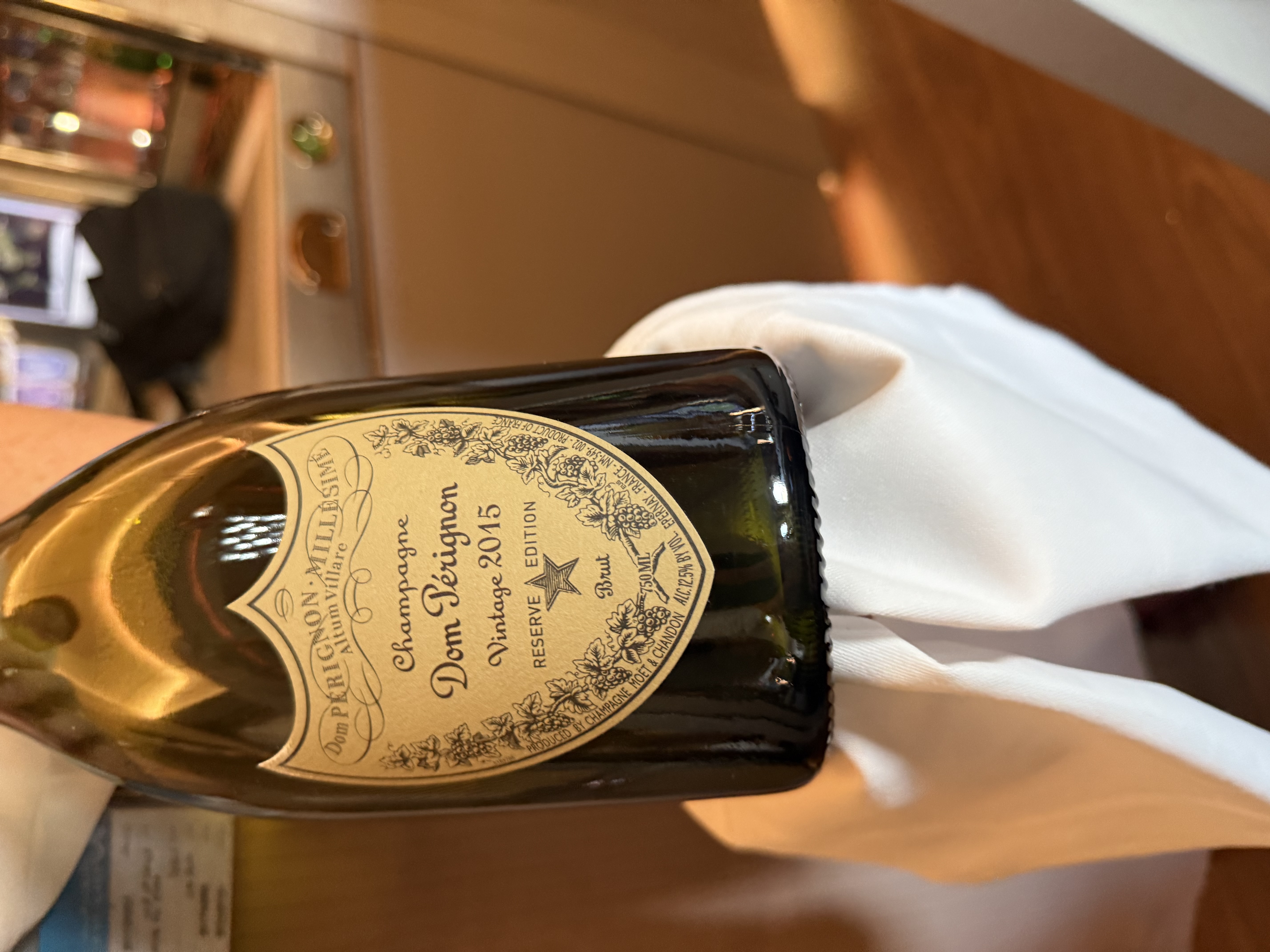 Dom Pérignon 2015 Reserve Edition champagne bottle in Emirates First Class