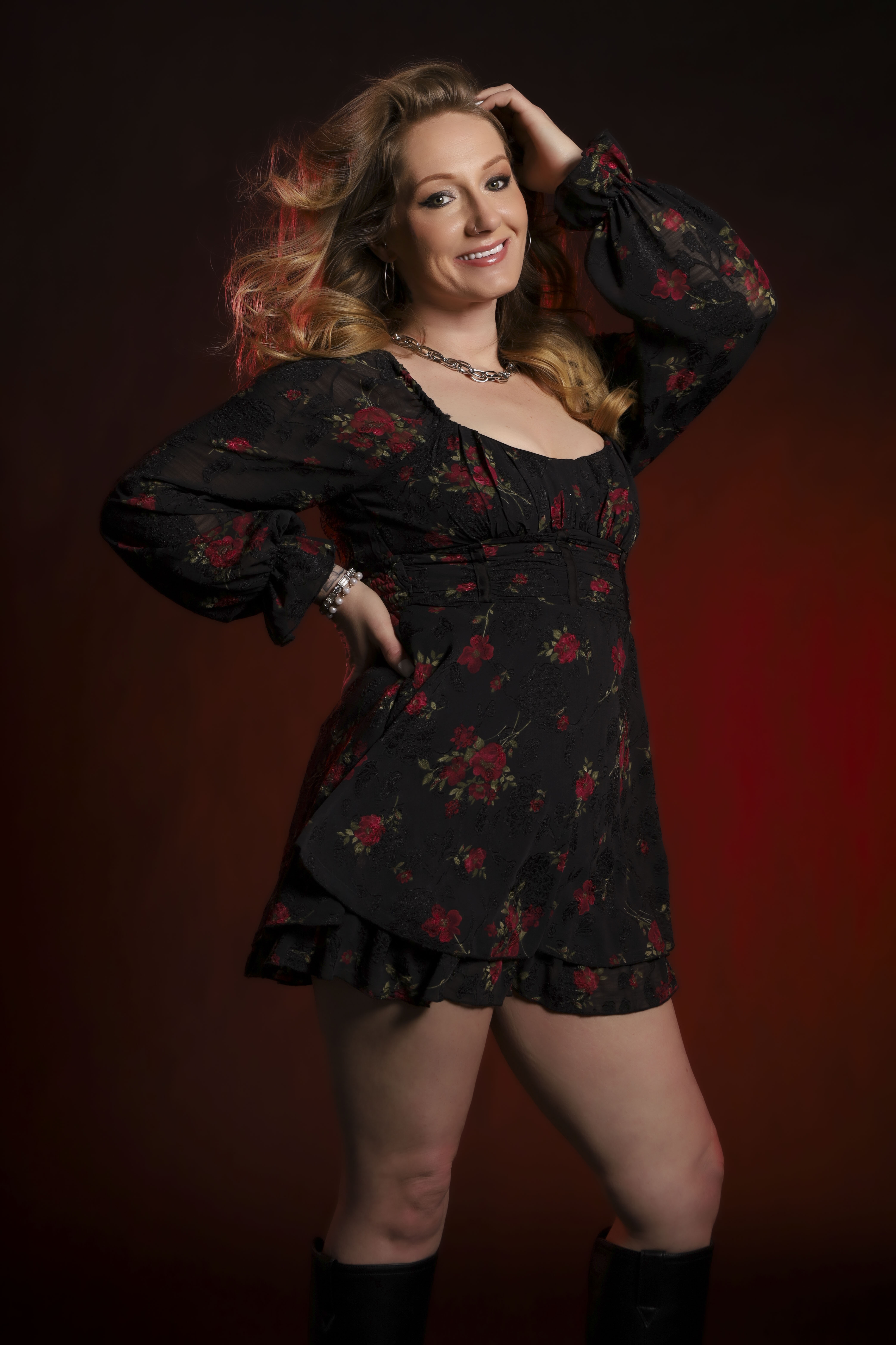 Brittany Harris in black floral dress