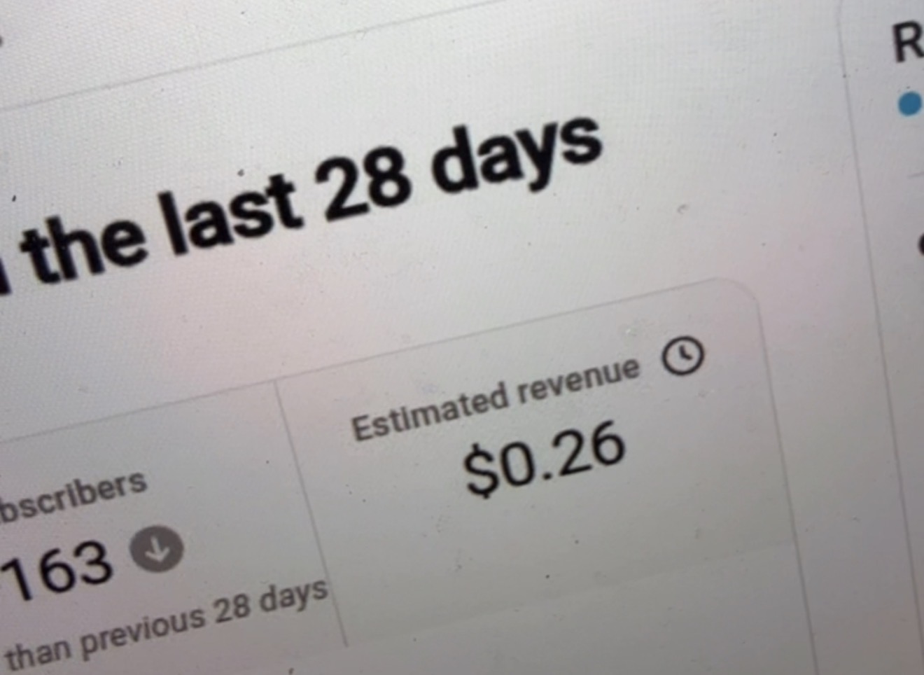 YouTube Analytics: $0.26 estimated revenue, 163 subscribers (newer channel)