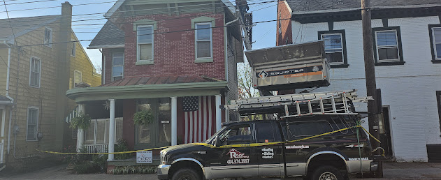 Professional job site setup with branded truck Equipter and caution tape — Lebanon PA urban roofing