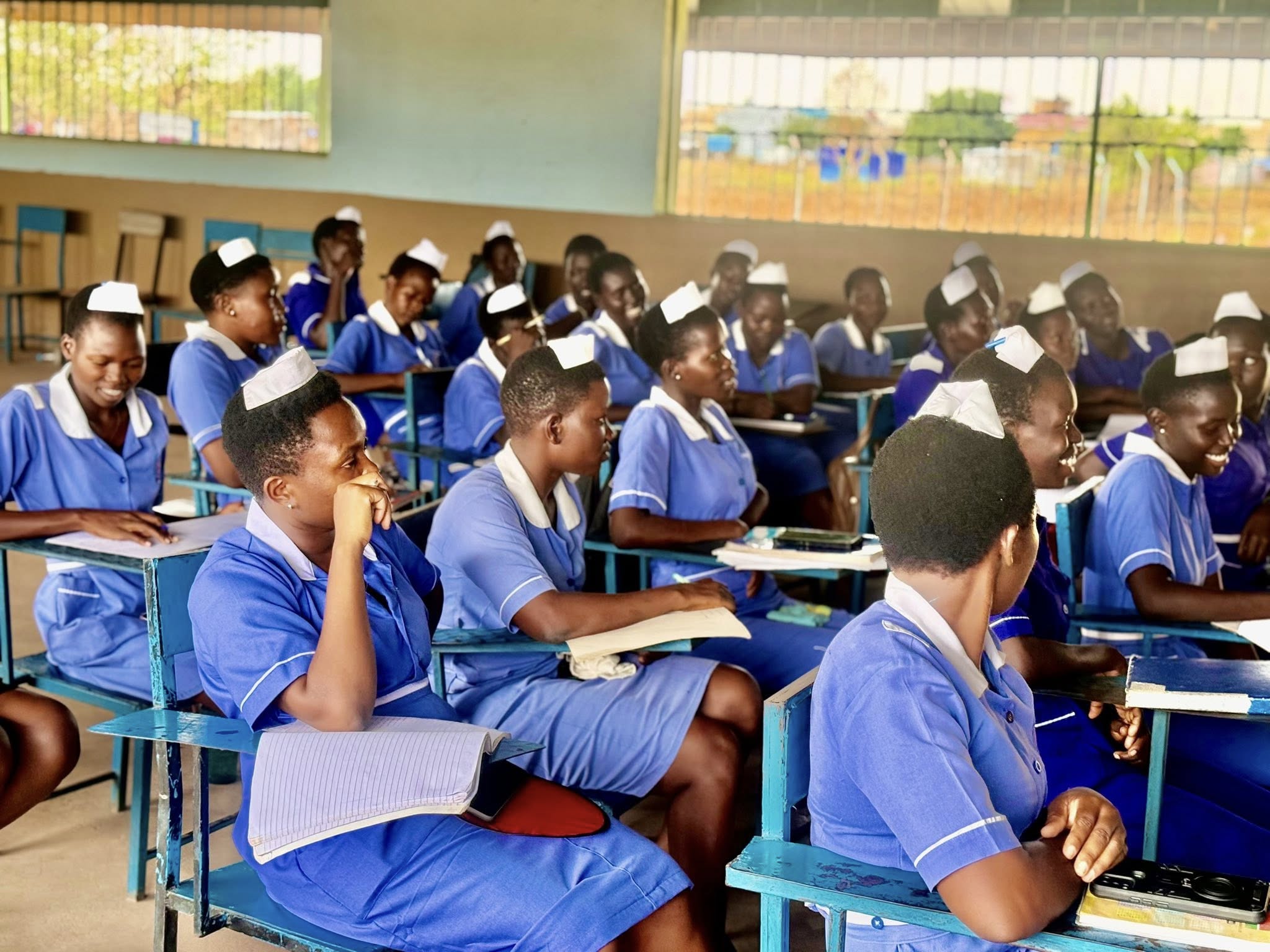 Nursing students studying in classroom