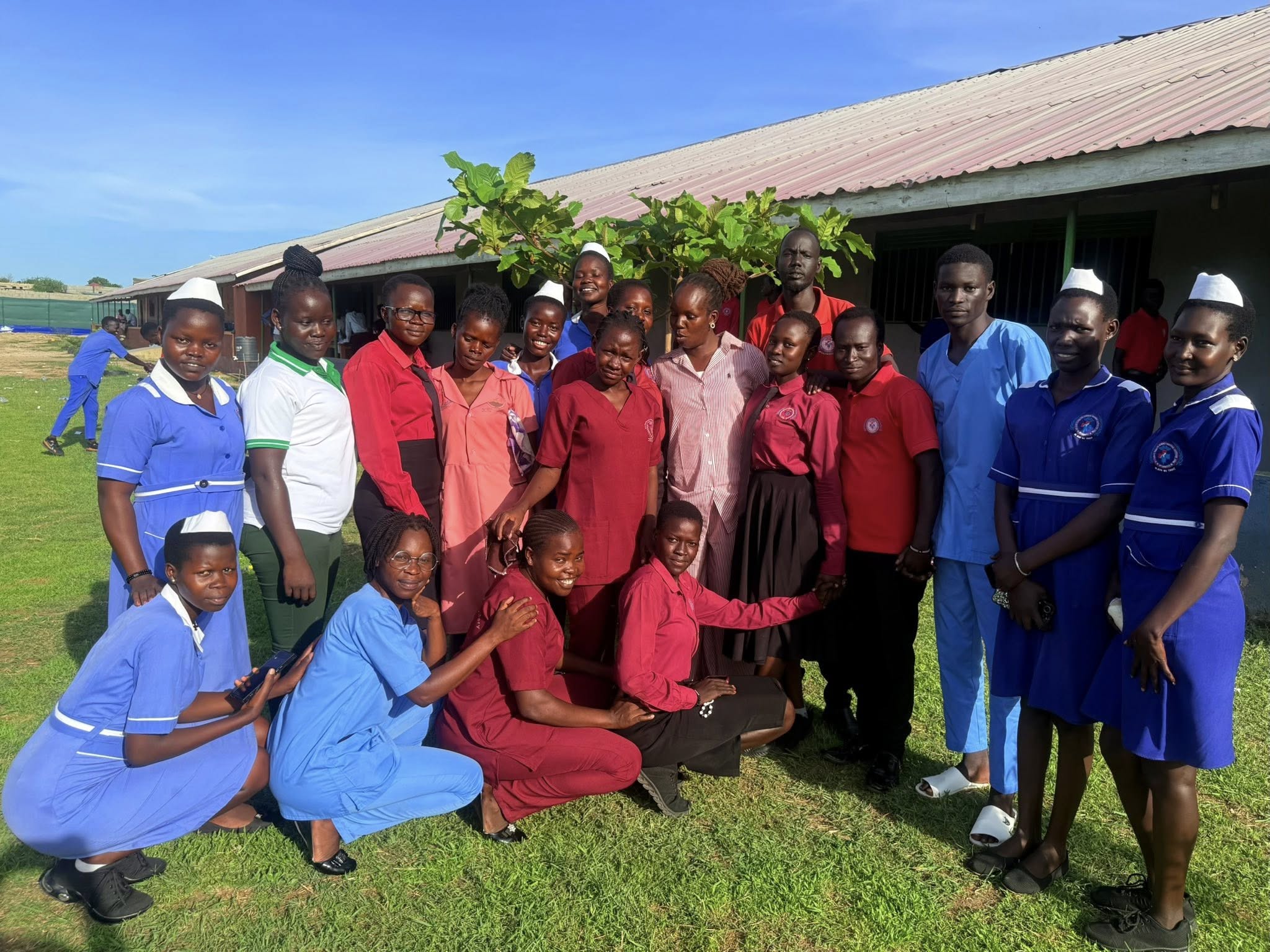 Students group photo outside campus