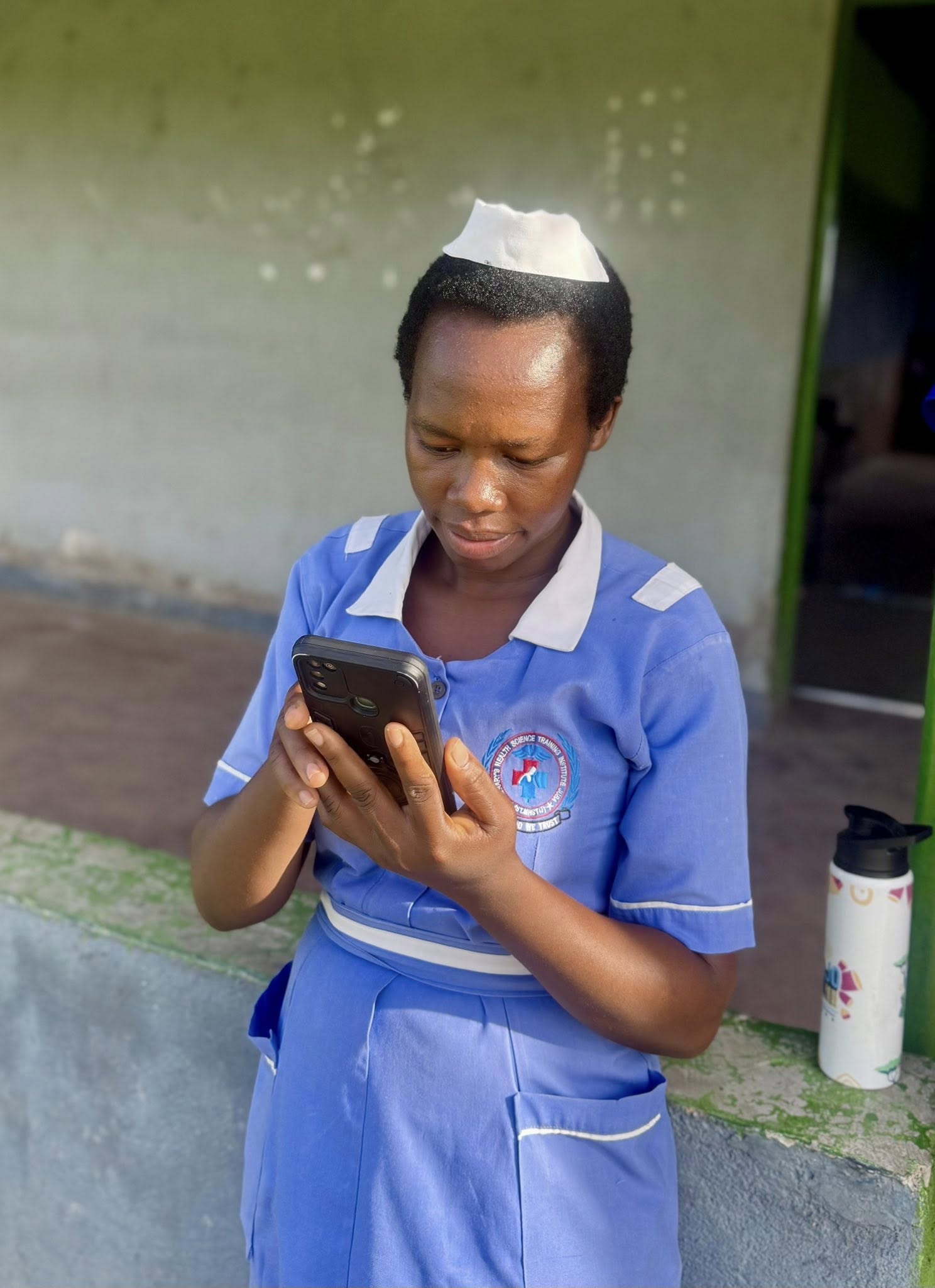Student using phone on campus