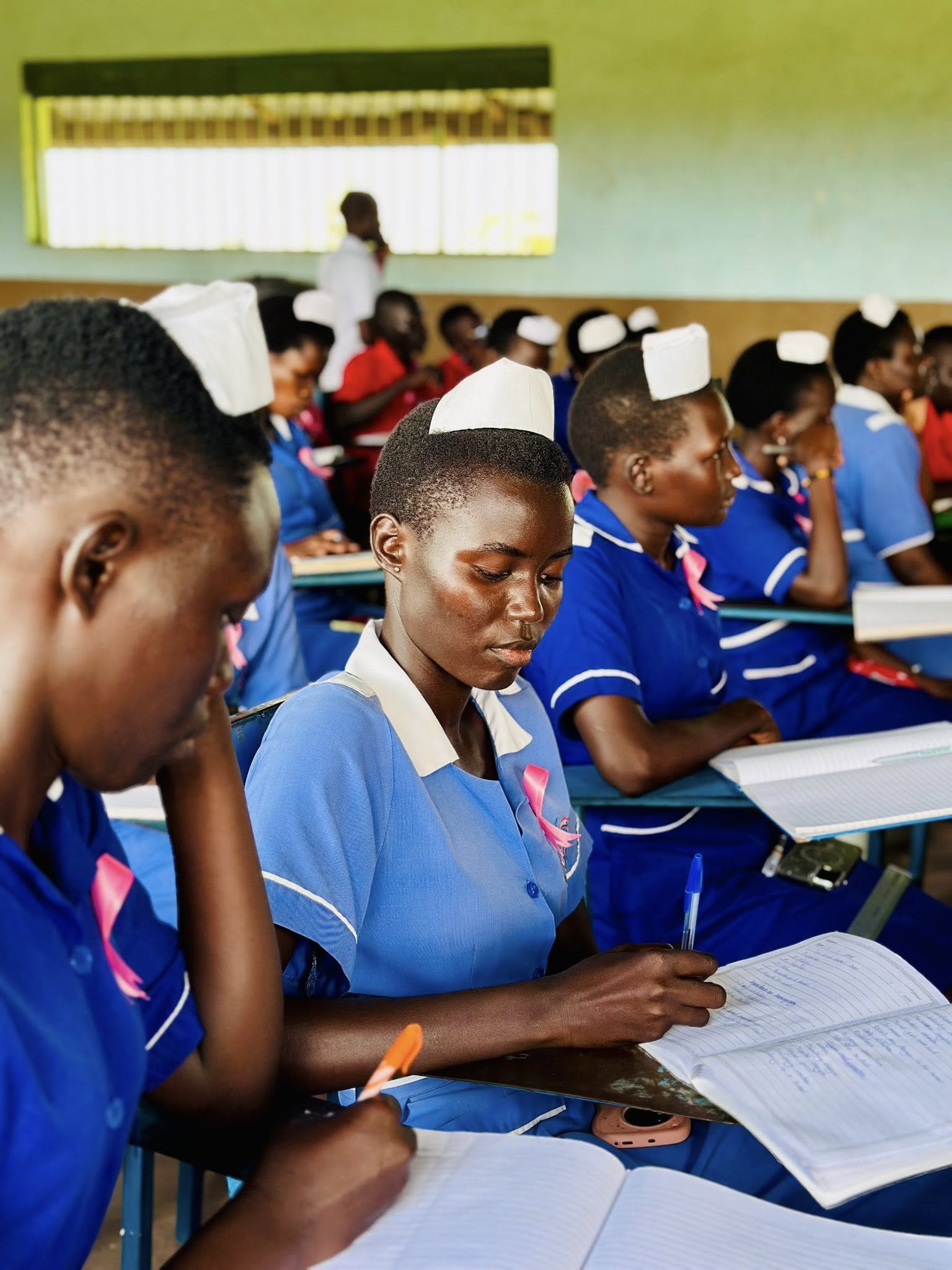 Large nursing class in blue uniforms