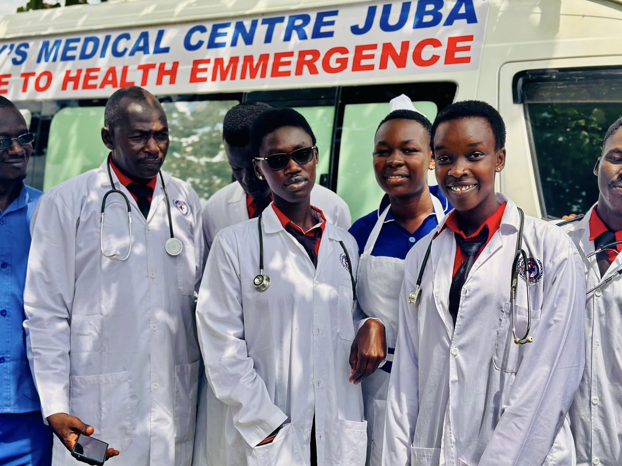 Medical students learning clinical examination at bedside