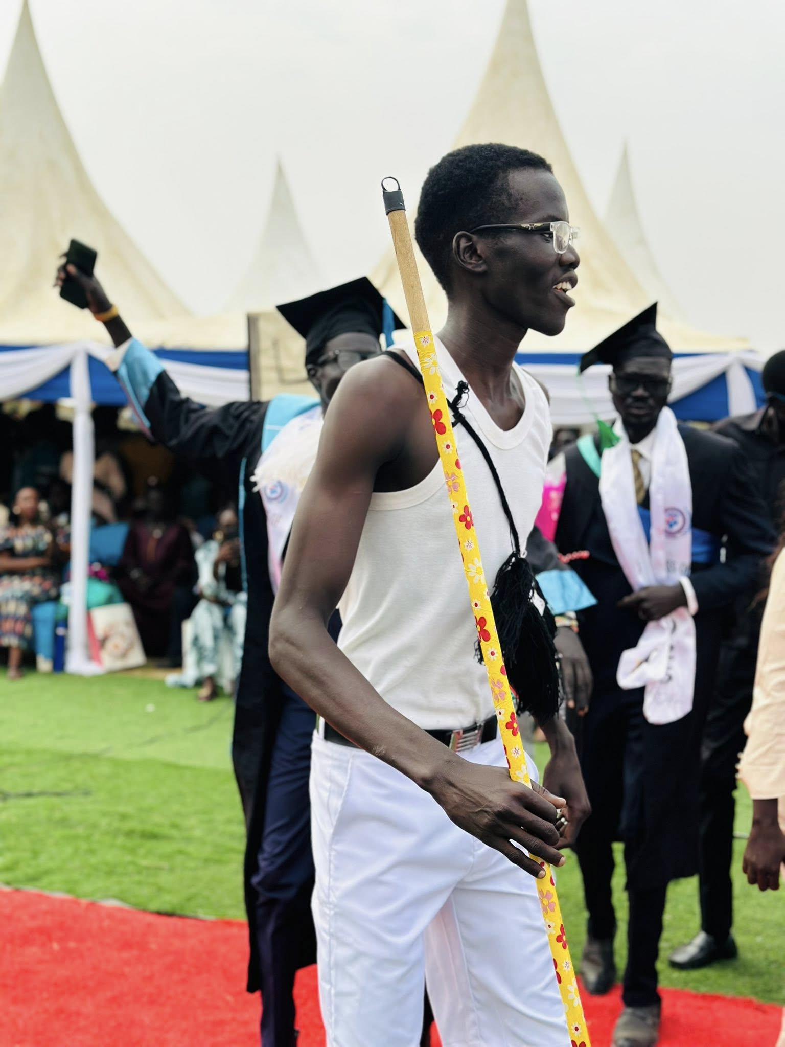 Graduates celebrating at graduation ceremony