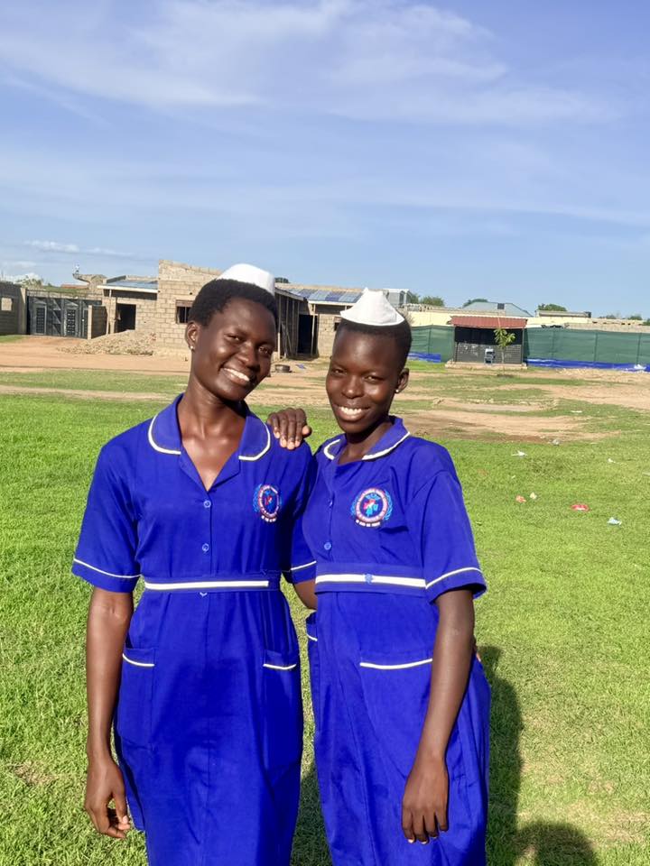 Two nursing students on campus