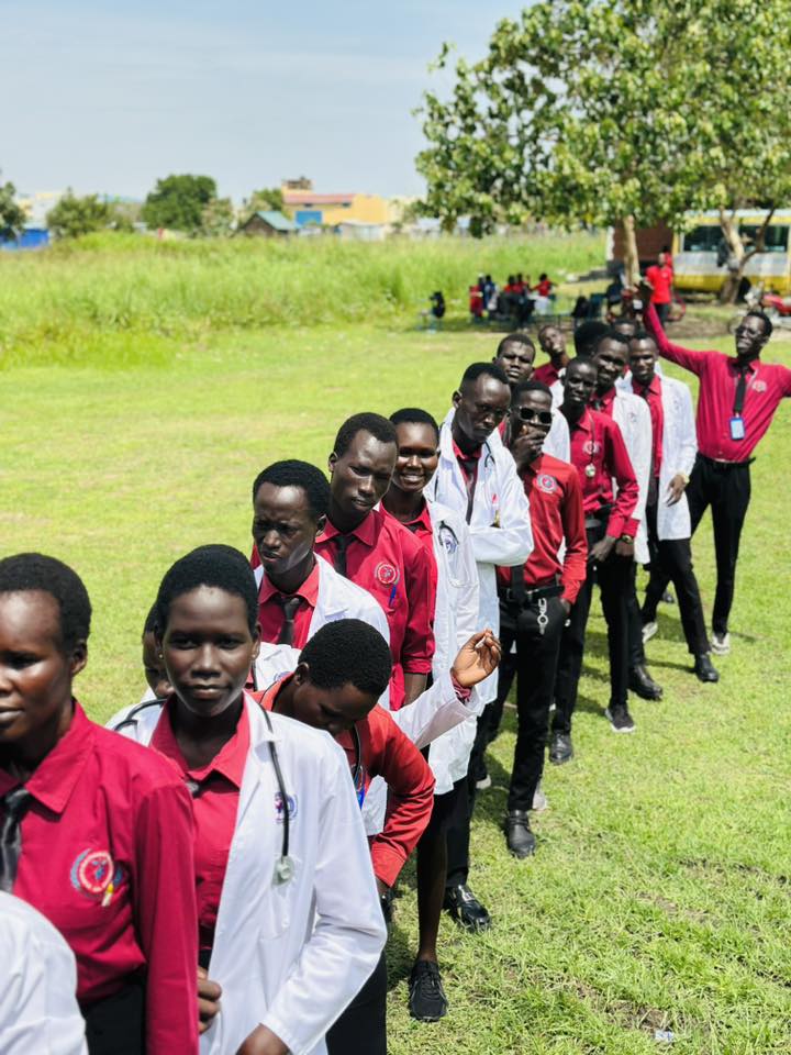Nursing student preparing equipment in ward