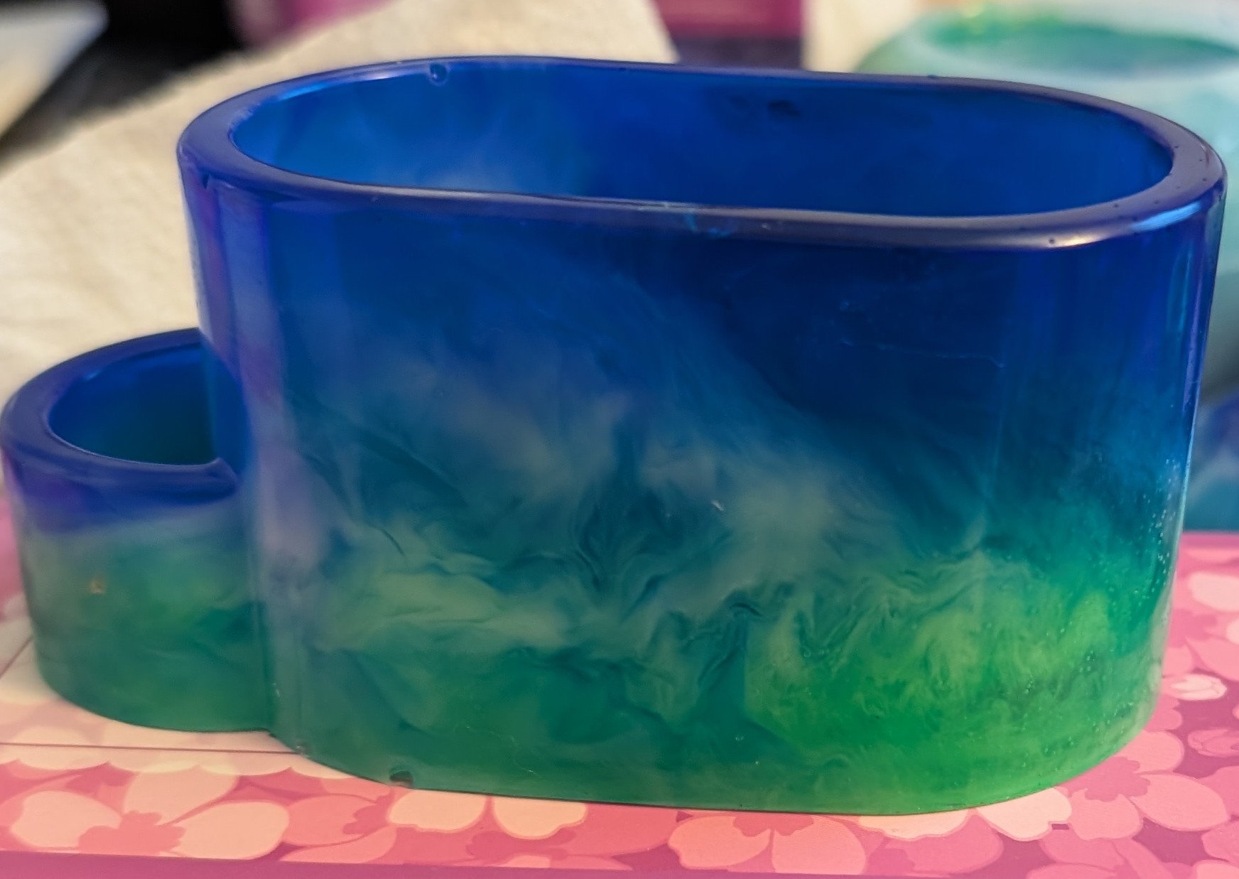 Handmade blue-green resin heart-shaped candle holder and organizer