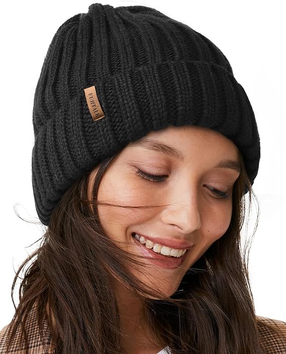 Knit Winter Hat - Black — A ribbed knit beanie finishes the look.