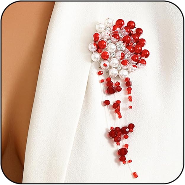 Blood Red Pearls Brooch — A red and pearl brooch adds the one unexpected detail.