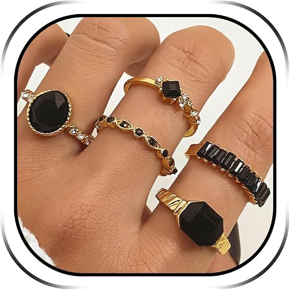 Black Obsidian Ring, Stackable Gold Tone — A stack of rings finishes the hand.