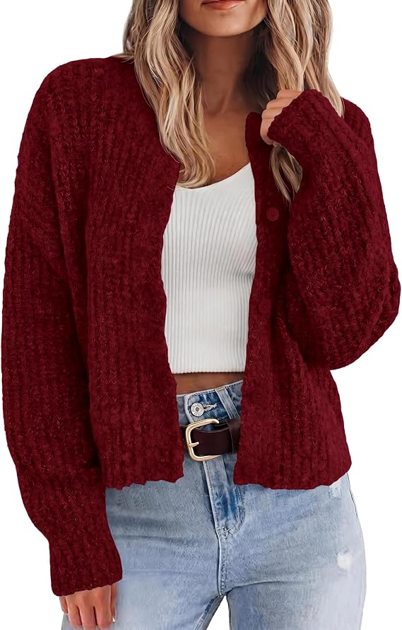 BTFBM Wine Red Cropped Cardigan — Open-front, chunky knit, cropped just above the waistband. This is the piece that sets the whole palette — wine red instead of literal team-color red, which reads as intentional styling rather than a costume. Layers easily over the tank underneath and works just as well once the sun goes down and the temperature drops.