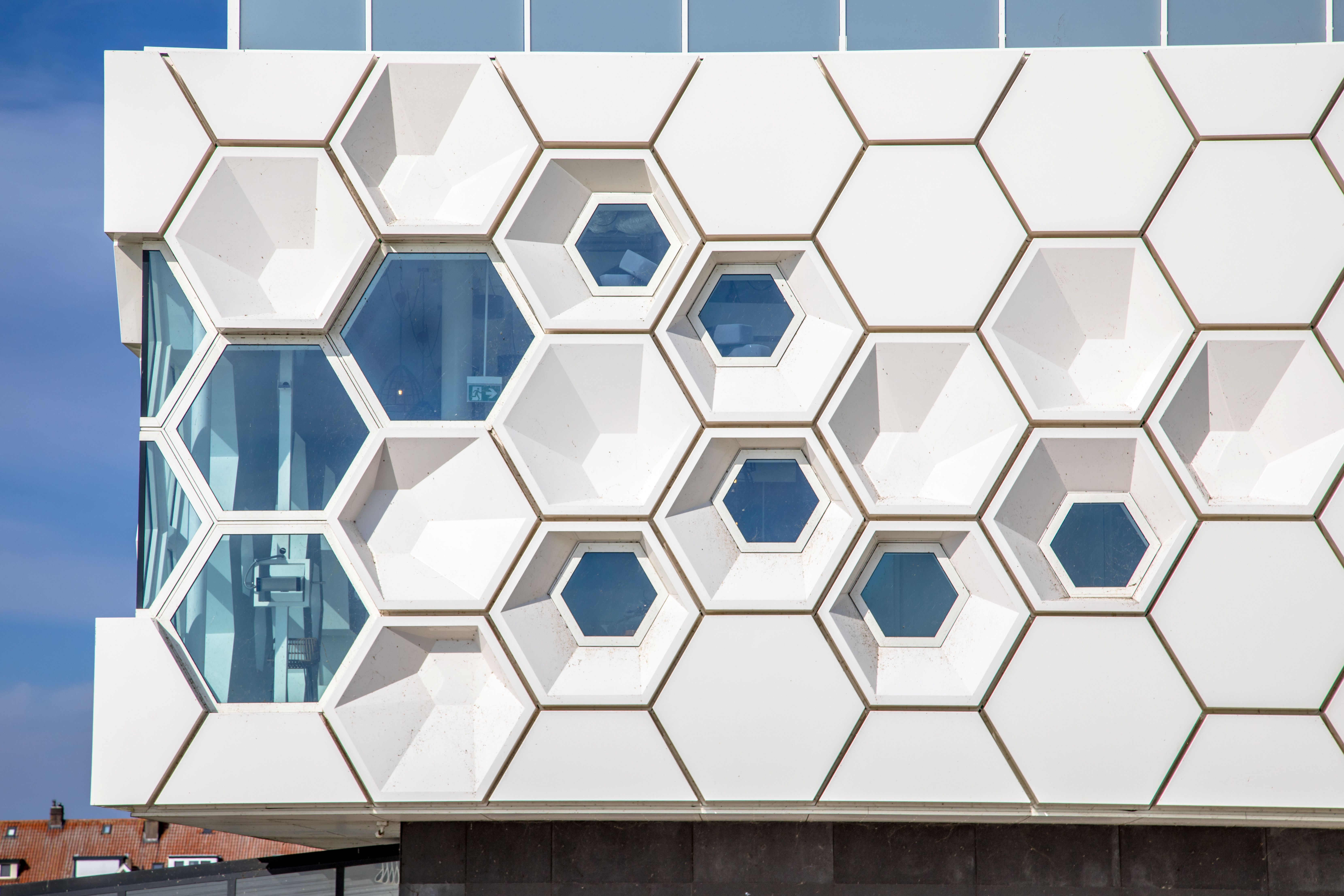 Architectural facade material comparison — GFRC panels, precast concrete, and cast stone cladding systems for commercial buildings