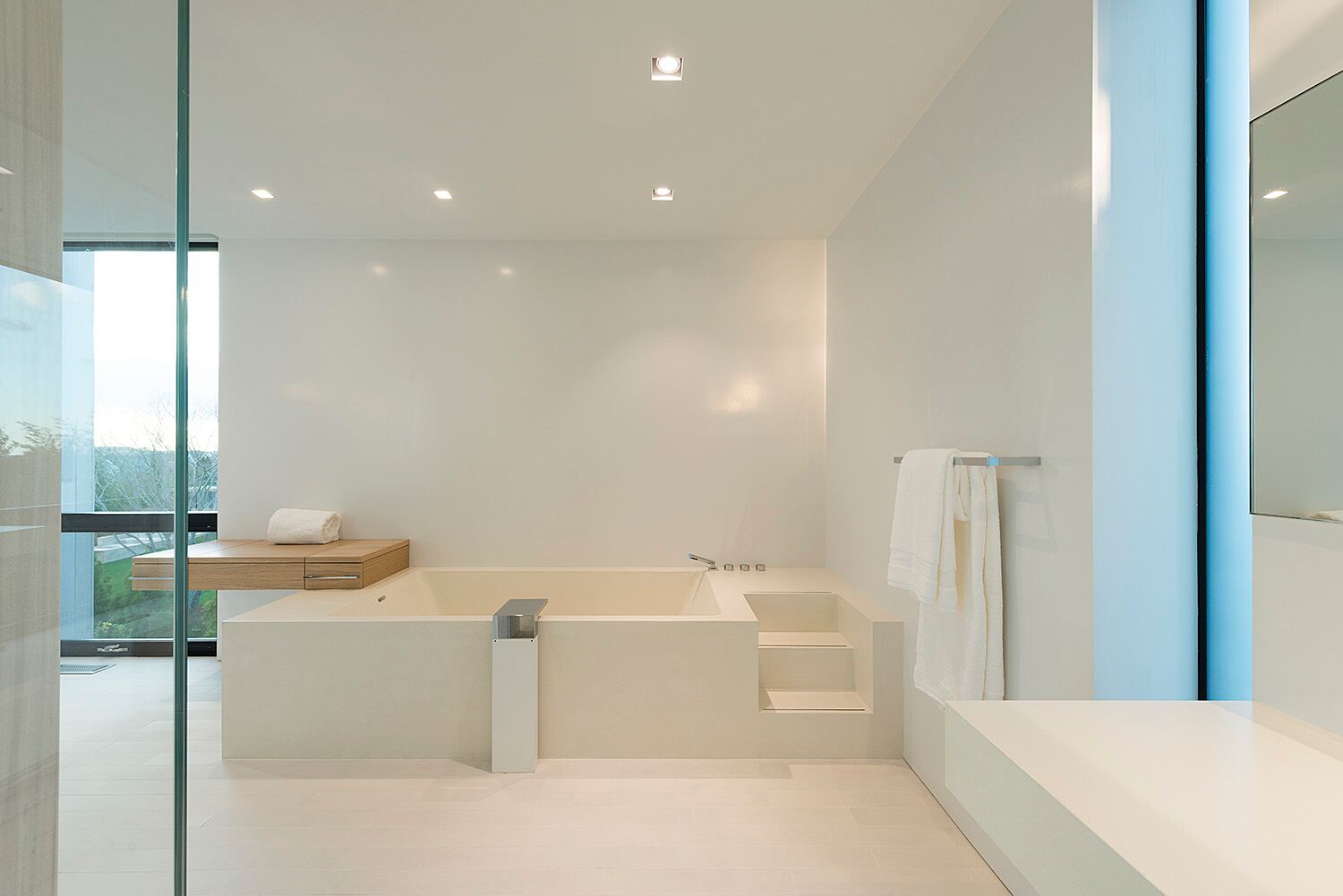 Freestanding GFRC bathtub in modern luxury master bathroom &mdash; Mesa Precast custom GFRC bathtubs for modern luxury residential design