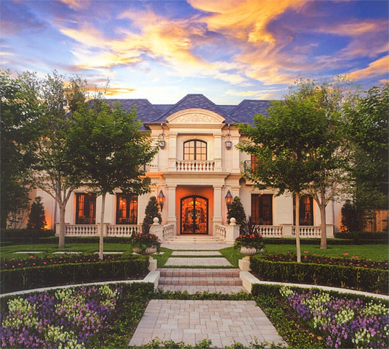 Grand French estate facade at twilight