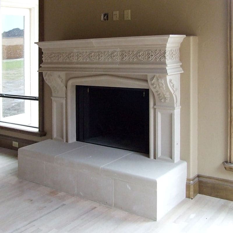 Gothic cast stone interior fireplace mantel — custom cast stone and GFRC fireplace surrounds