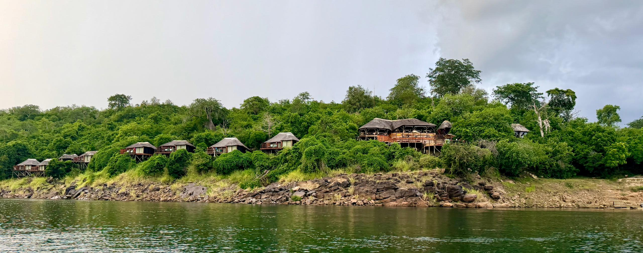 Serena Mivumo River Lodge — thatched chalets overlooking the Rufiji