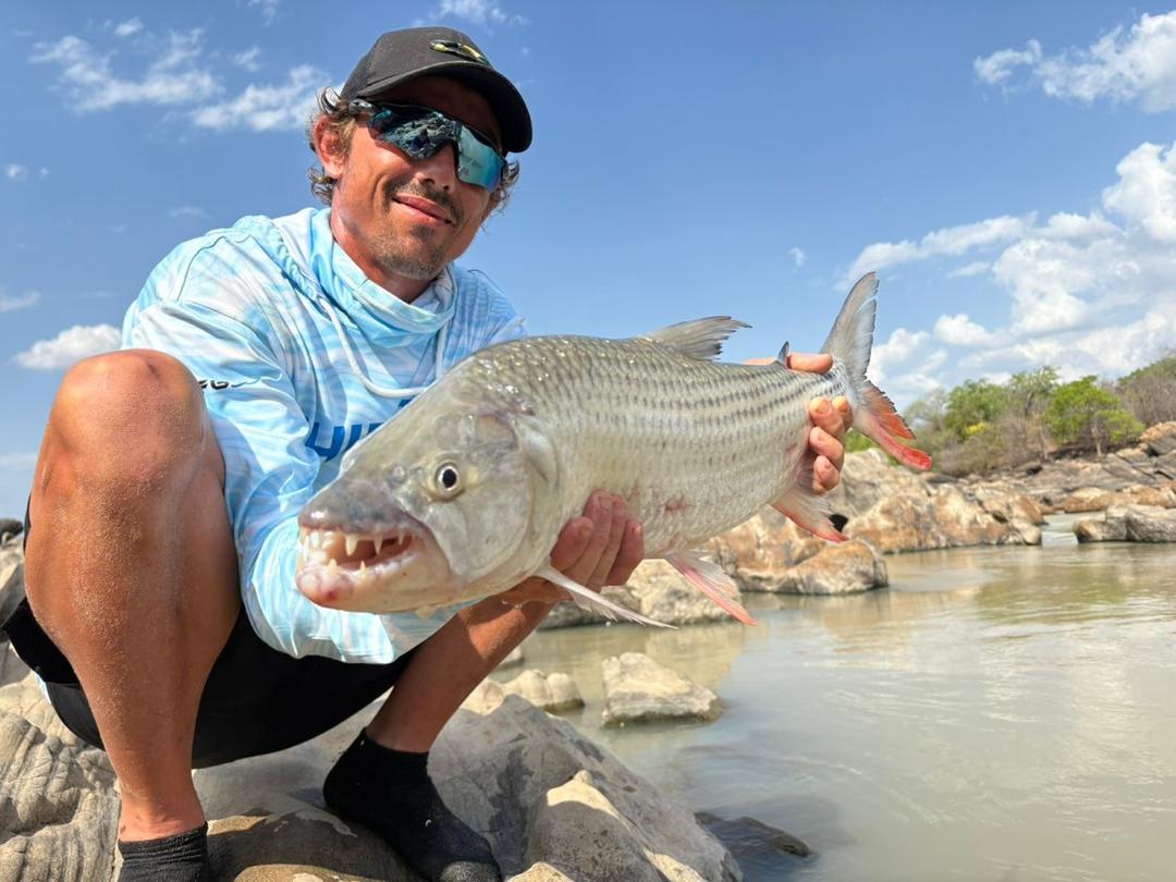 Angler with tigerfish on the Nyerere system