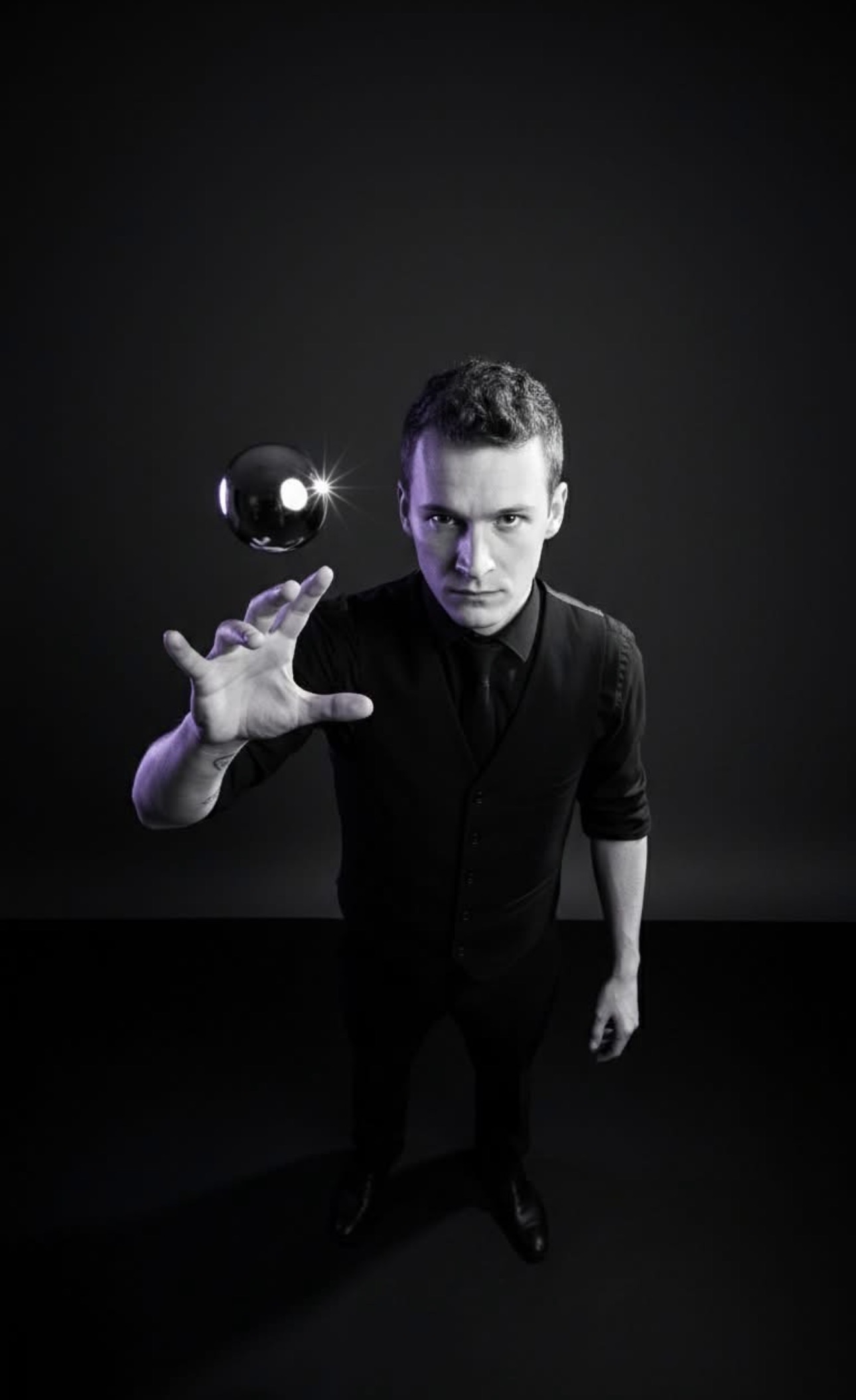 Foggy Jack holding a dramatic pose beside a floating black orb