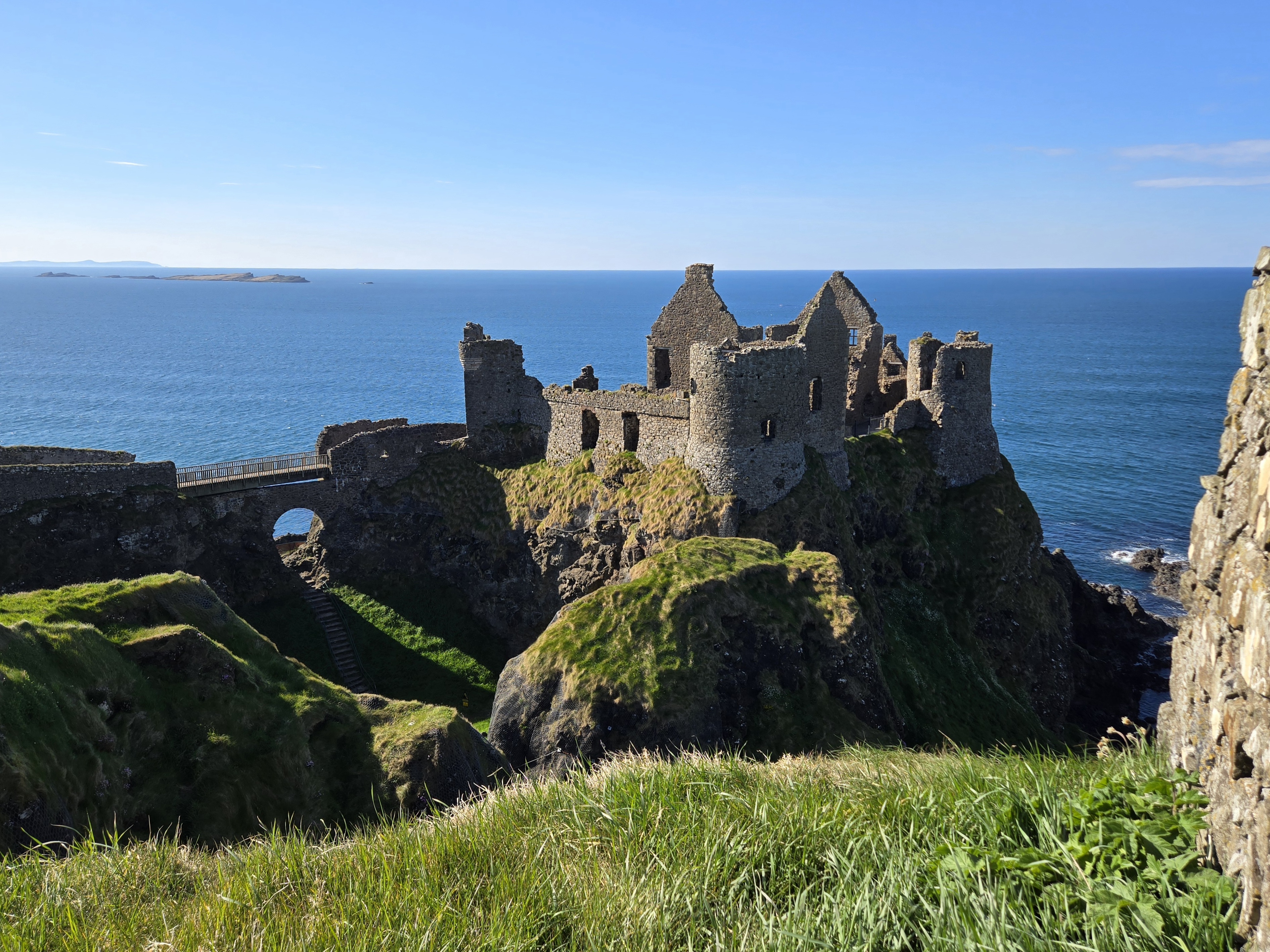 Stone ruins of a coastal castle above the sea