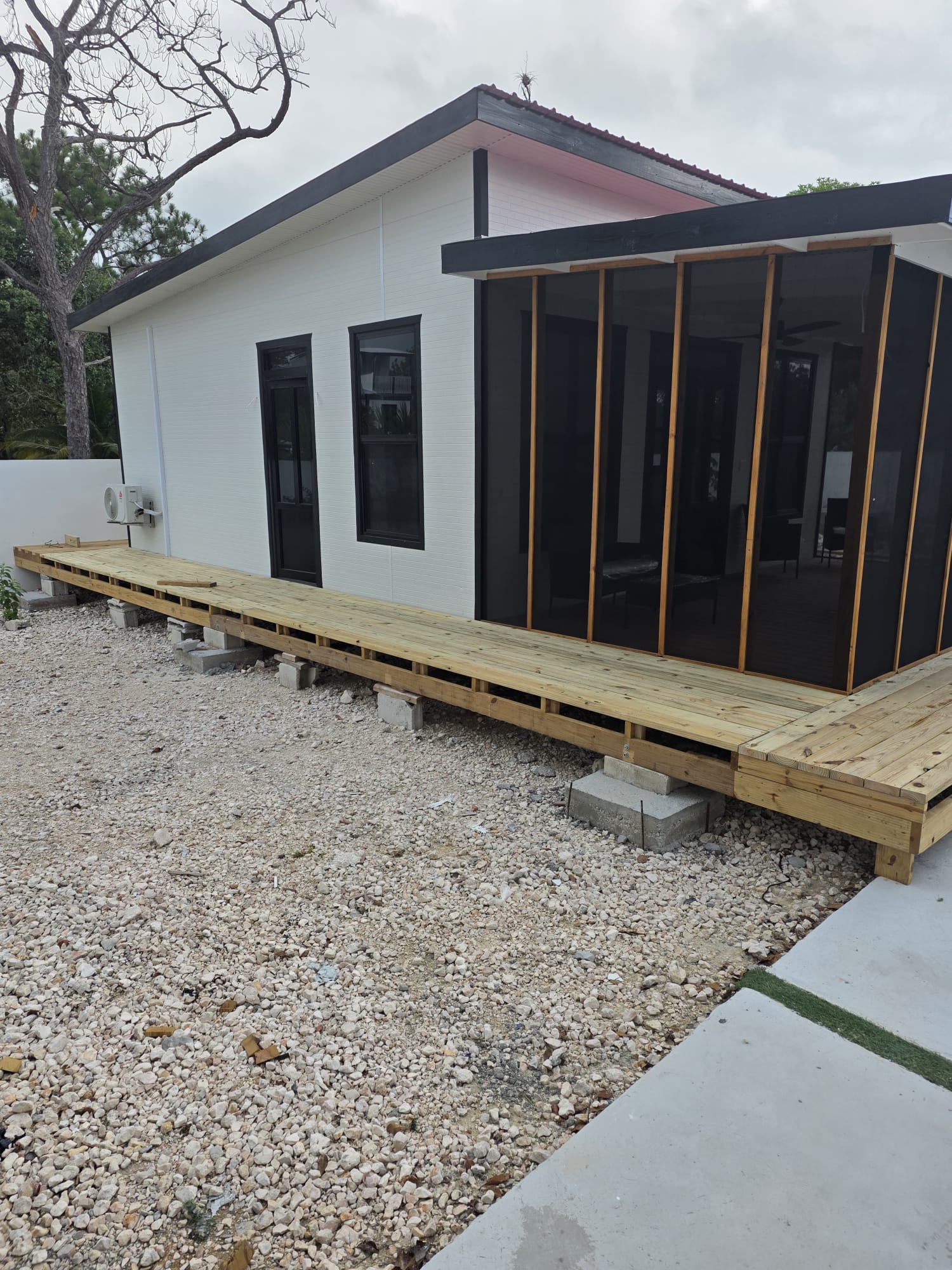 Cabin exterior on a raised deck at Lumen Retreat.