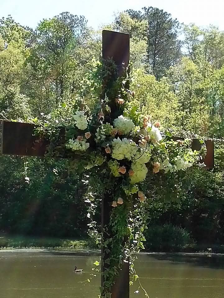 Wedding cross floral arrangement