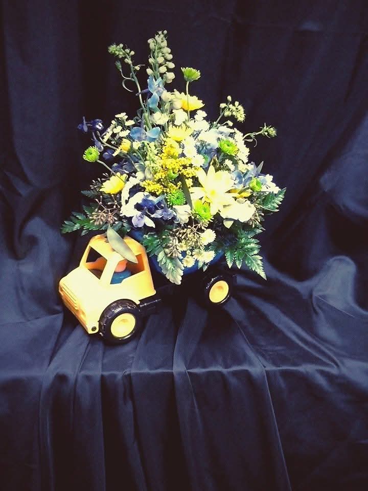 Creative floral dump truck arrangement