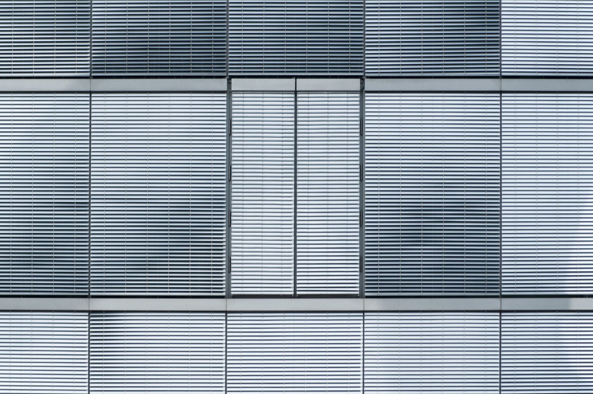 Blue-grey louver facade, modern architectural grid