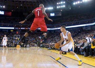Armon Johnson defending against the Warriors