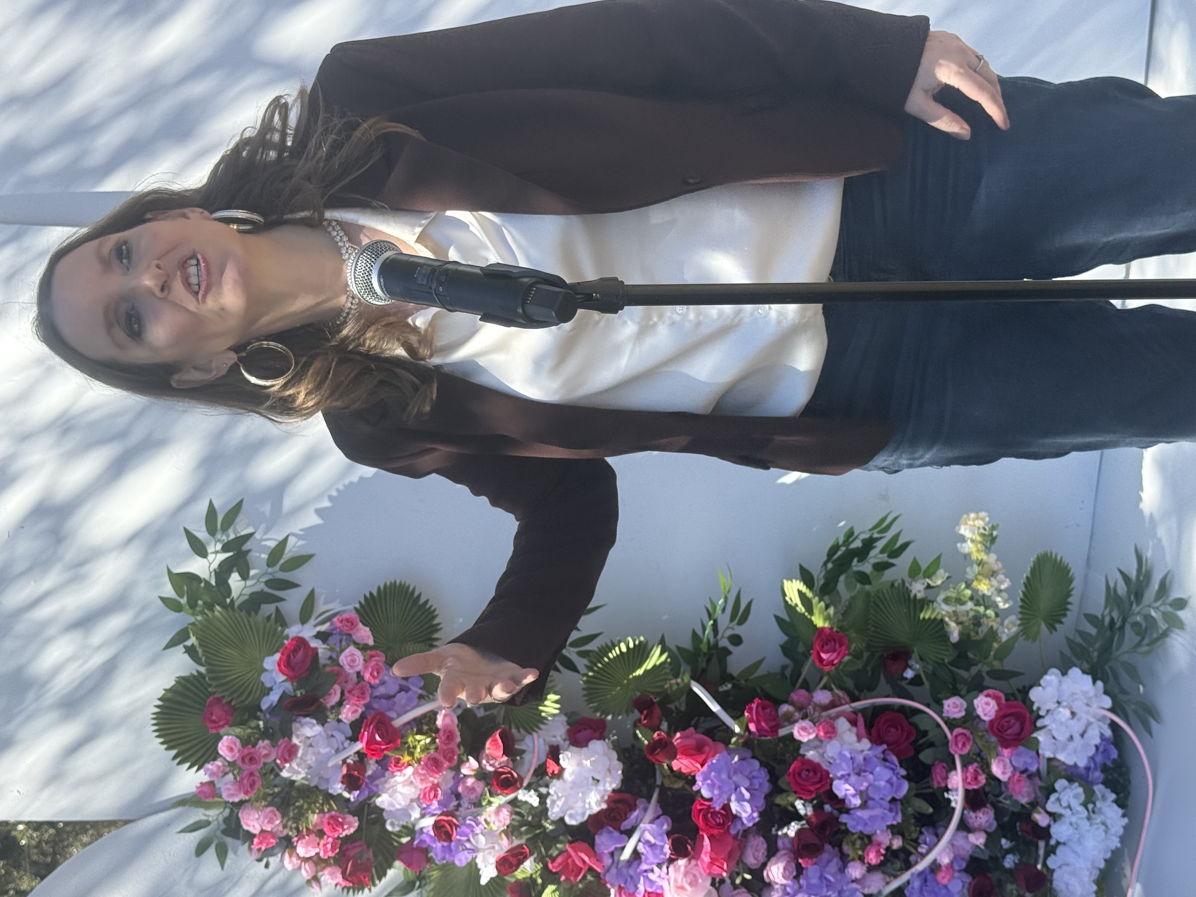 Dr. Dye speaking outdoors